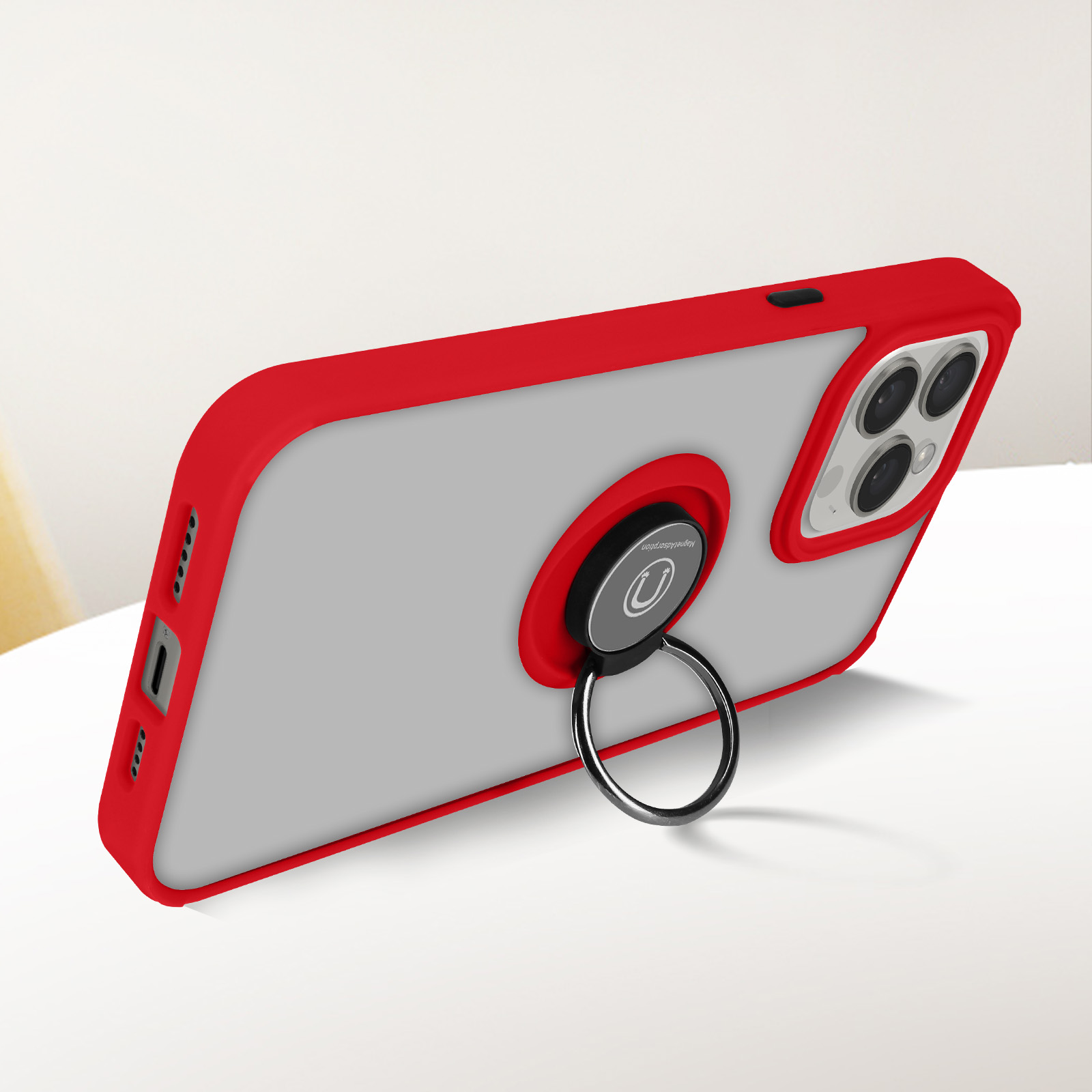 Custodia per telefono con cornice rossa e anello di supporto su superficie bianca.