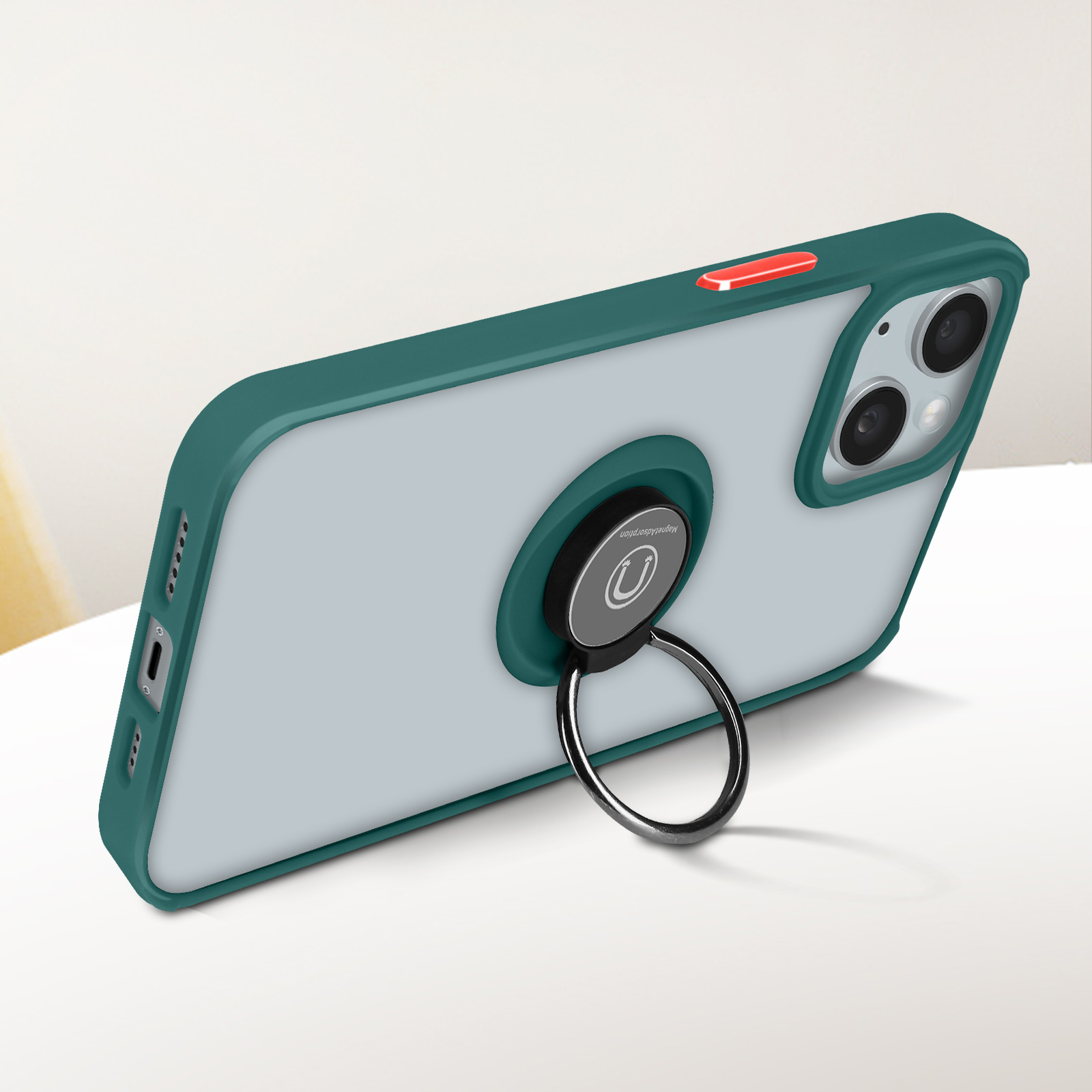 Telefono in custodia verde e trasparente con anello di supporto. L'anello è nero.