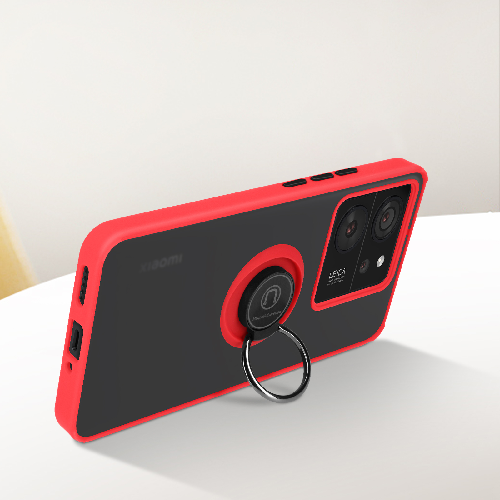 Custodia per telefono rossa e nera con anello. Etichetta Xiaomi sul lato.