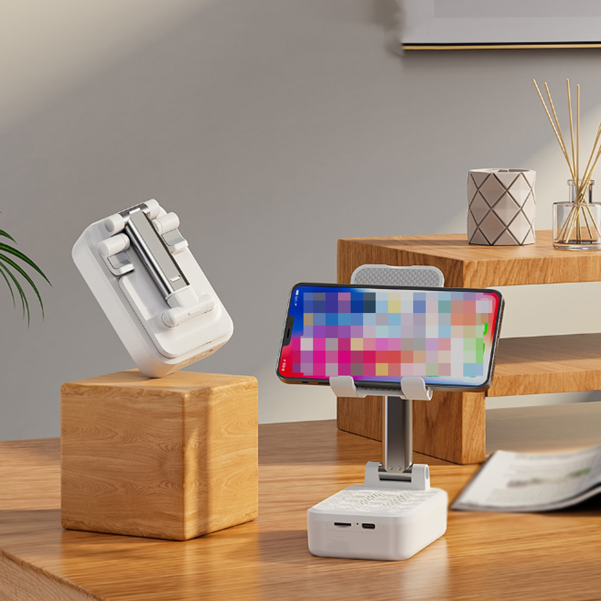 Ein Telefon auf einem Ständer mit buntem Display, ein Holzblock und ein Ständer.