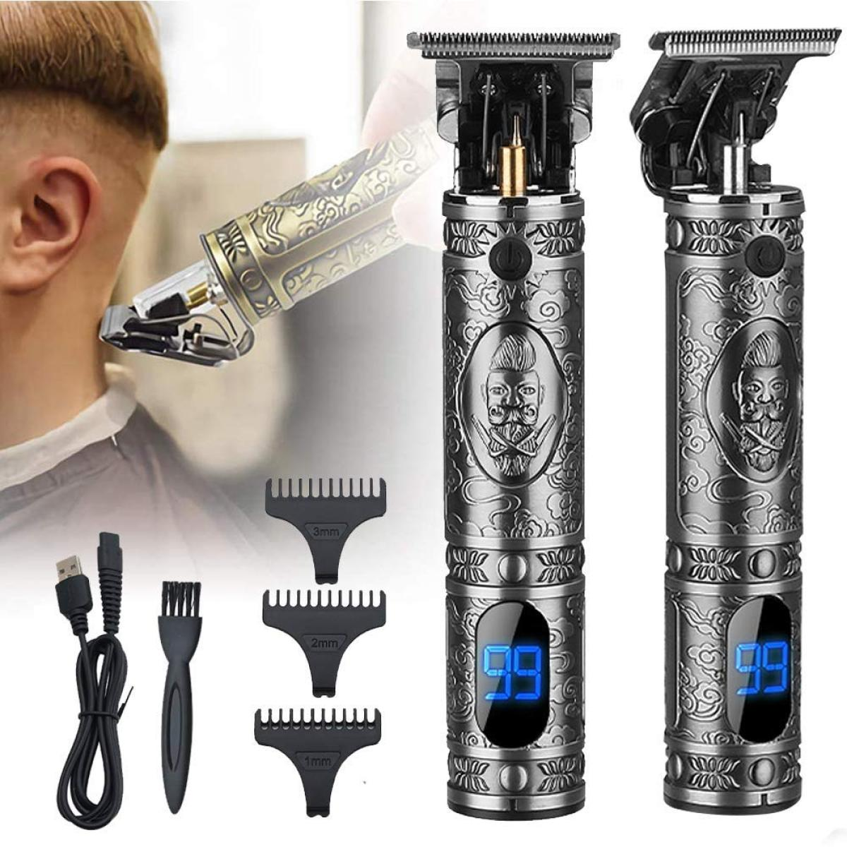 Zwei elektrische Haarschneidemaschinen mit Zubehör. Eine wird benutzt. Beide haben Displays.