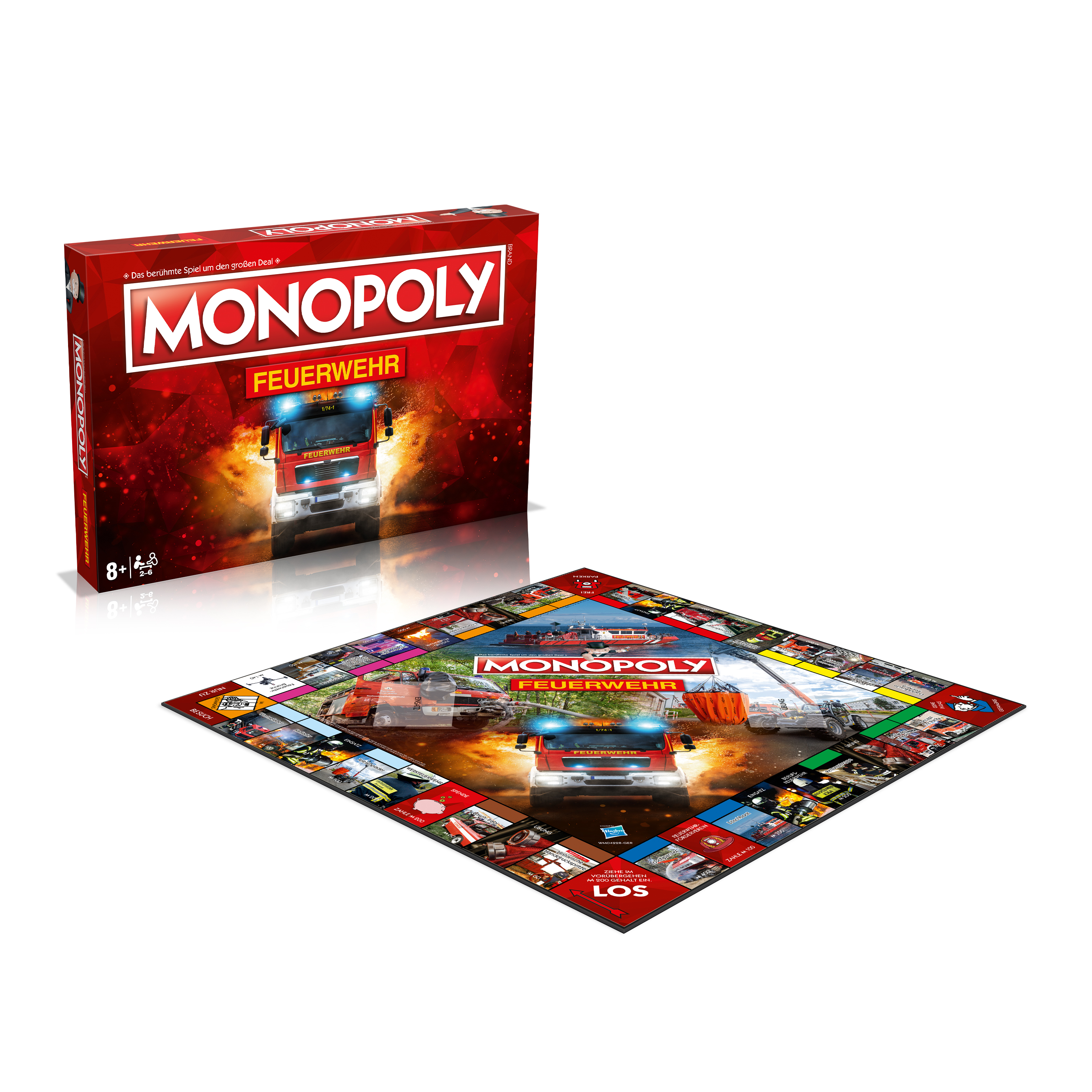 Monopoly-Brettspielbox und Spielbrett. Die Box zeigt einen Feuerwehrwagen und das Brett.
