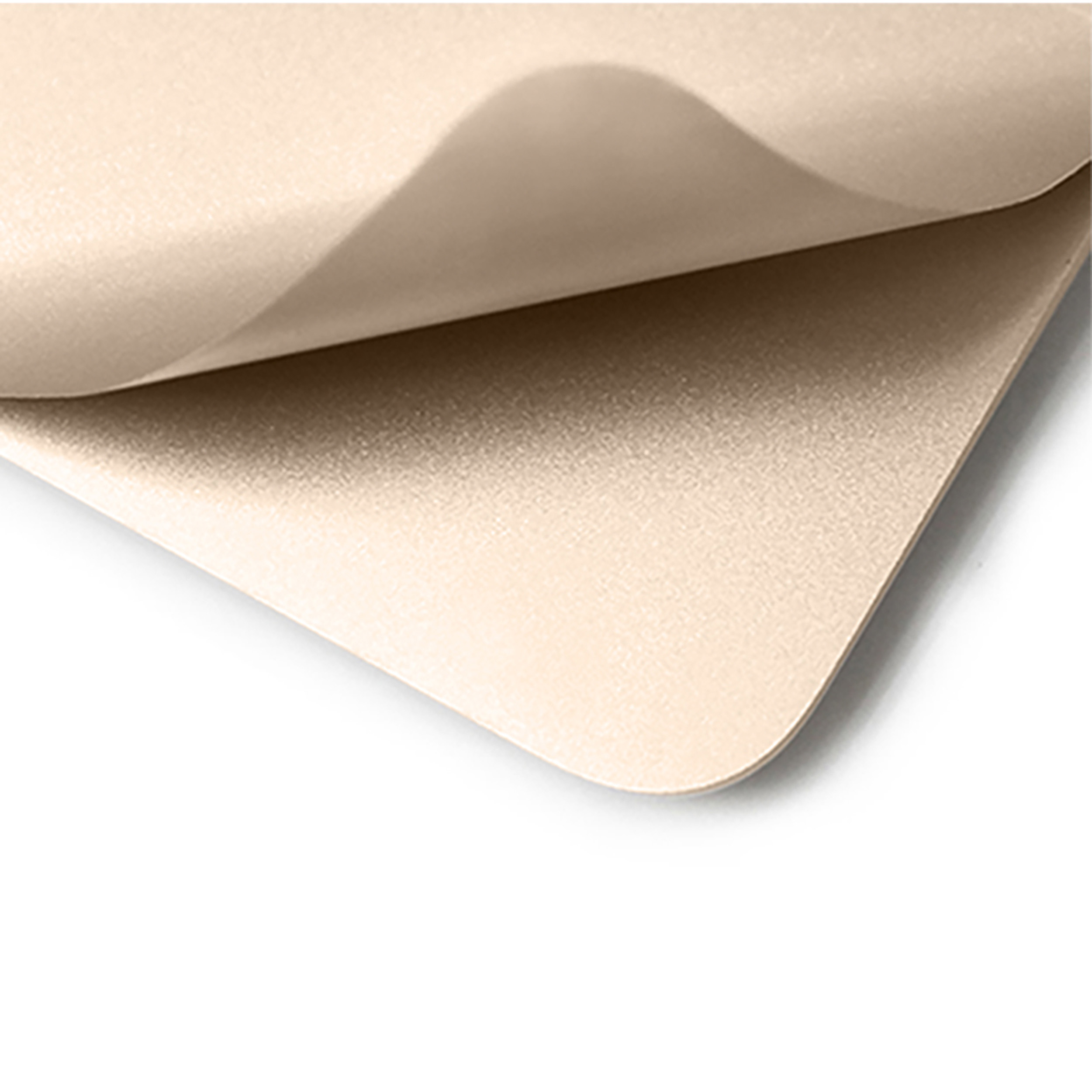 Beiges Material mit gebogenem Rand, möglicherweise Stoff oder Papier.