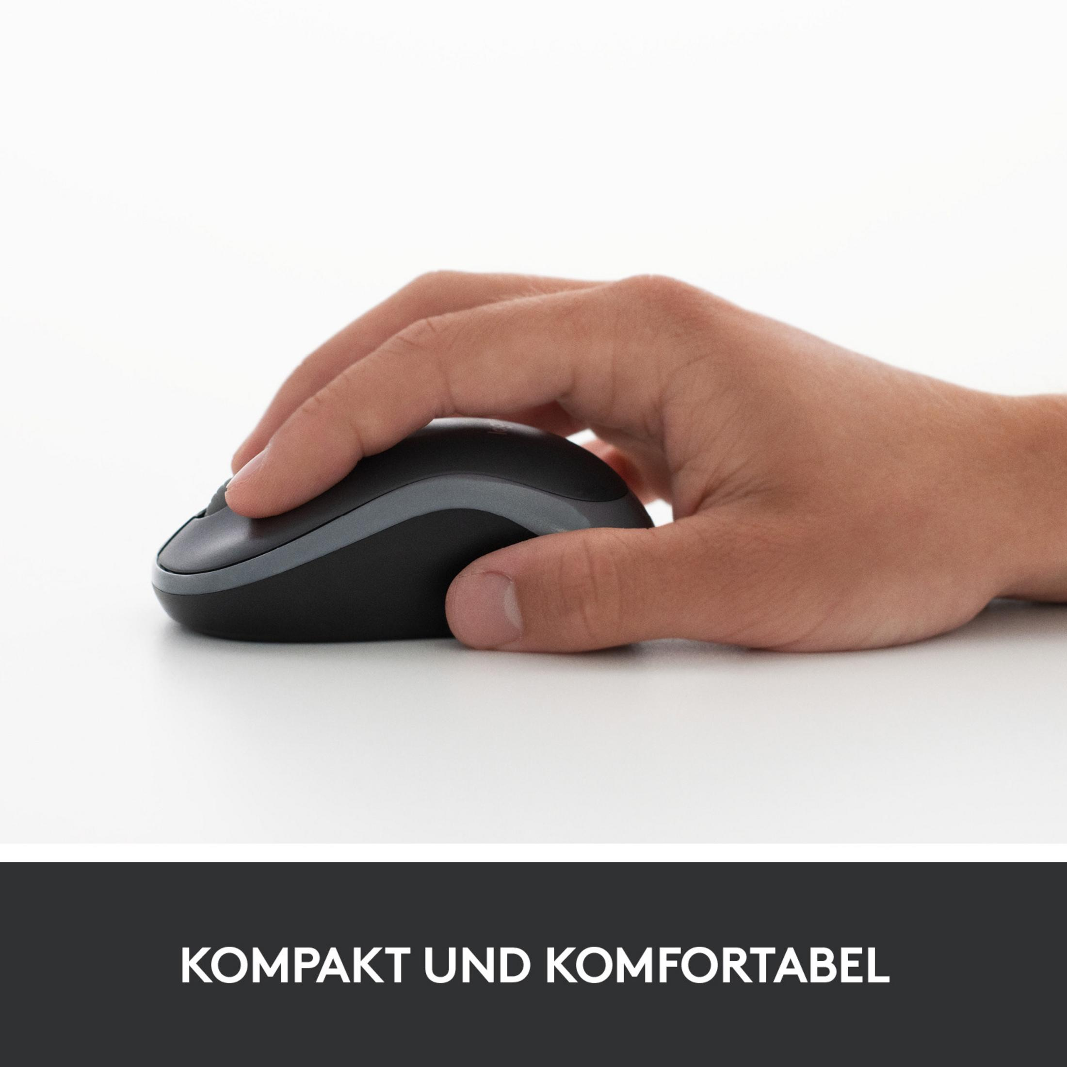 Hand benutzt eine schwarz-graue Computermaus. Der Text 'KOMPAKT UND KOMFORTABEL' steht unter der Maus.