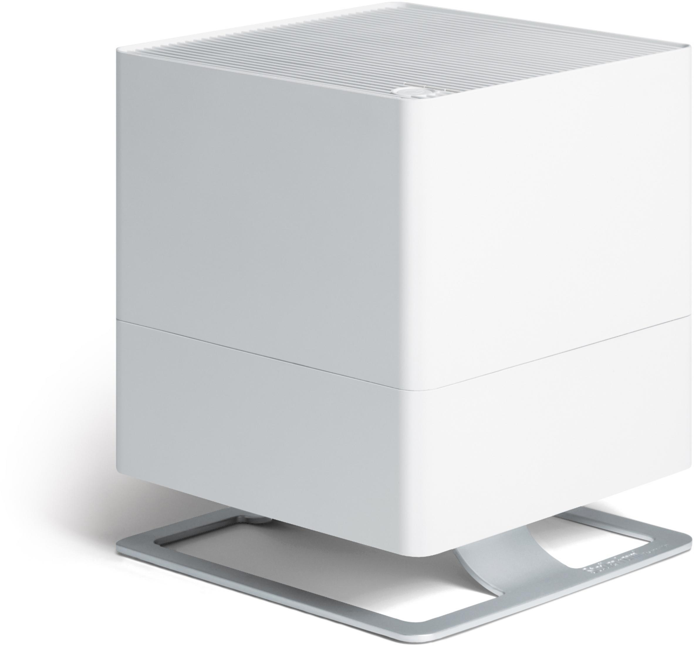 A white square humidifier with a silver base on a white background.