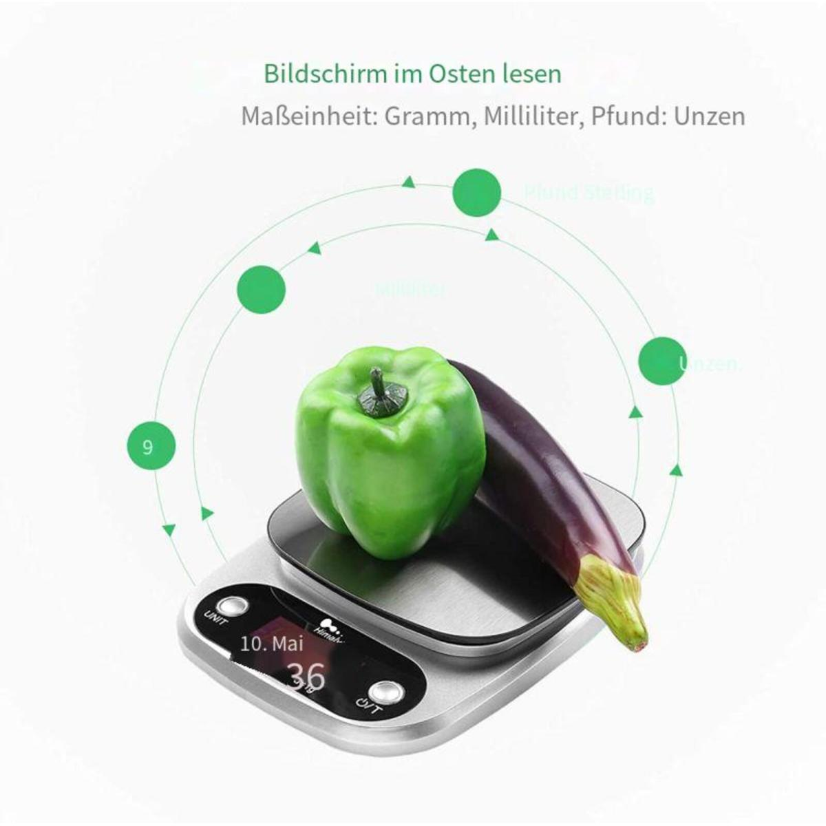 Digitale Waage mit grüner Paprika, Aubergine und Beschriftungen für Maßeinheiten.