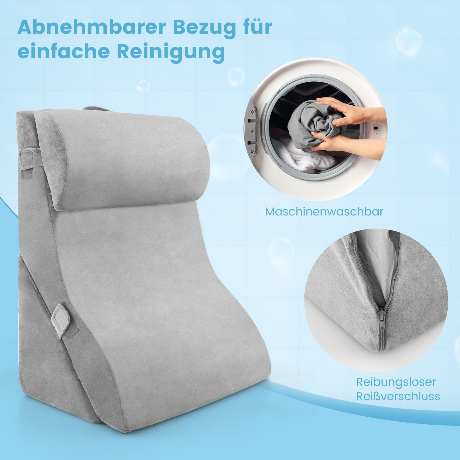 Ein graues Bettkeilkissen mit abnehmbarem Bezug. Das Kissen hat einen Reißverschluss und befindet sich vor einer Waschmaschine.