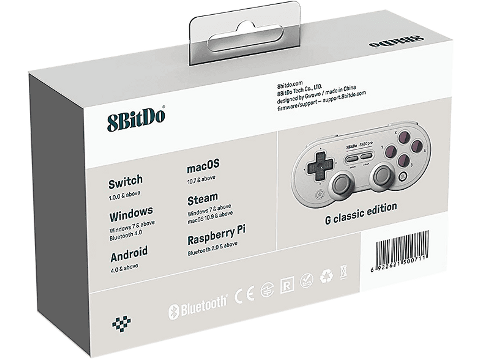 Białe pudełko ze zdjęciem kontrolera. Tekst: 8BitDo, Switch, Windows, macOS, Steam, Raspberry Pi i Bluetooth.