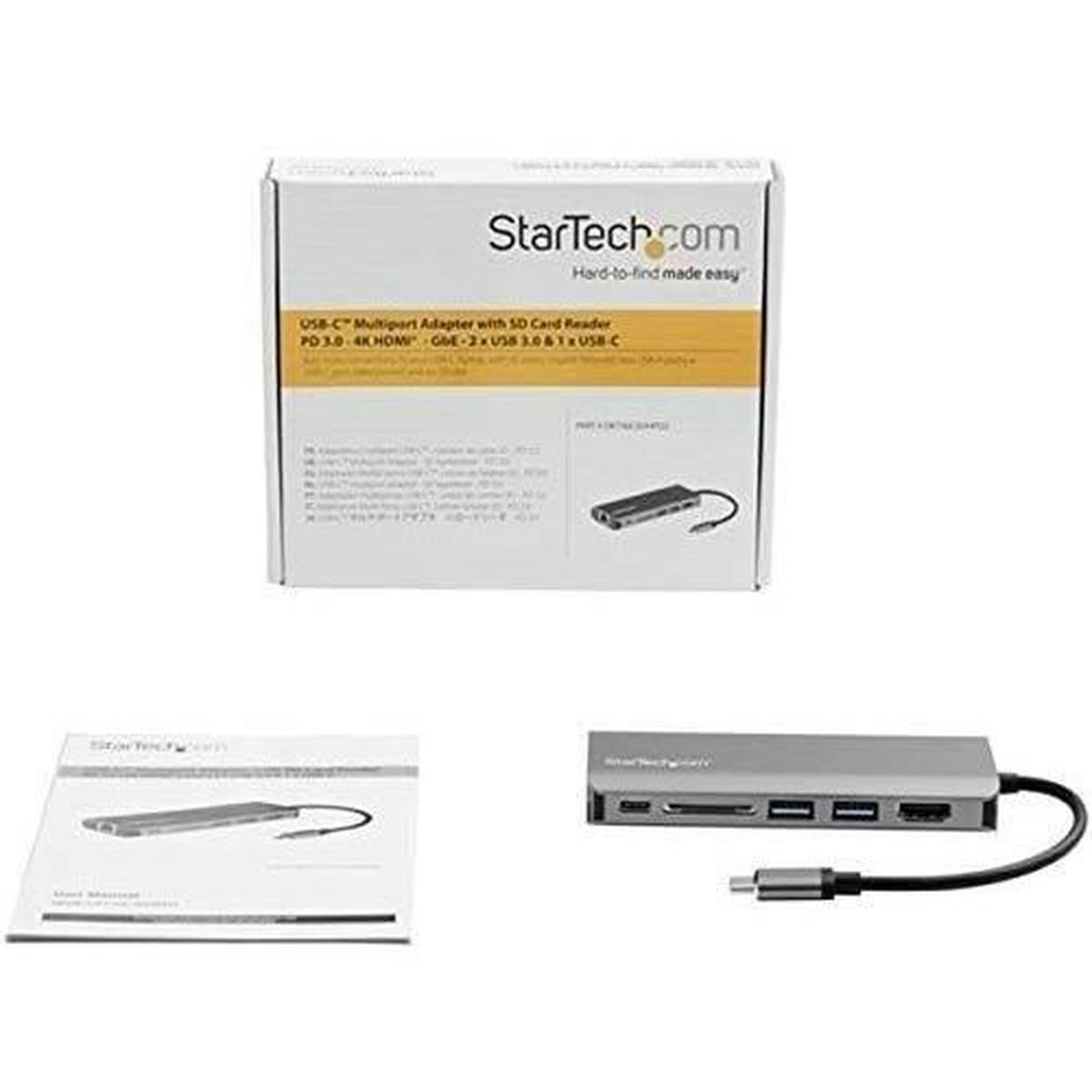 Verpackter Multiport-Adapter und Zubehör, auf weißer Oberfläche, mit Produktinformationen.