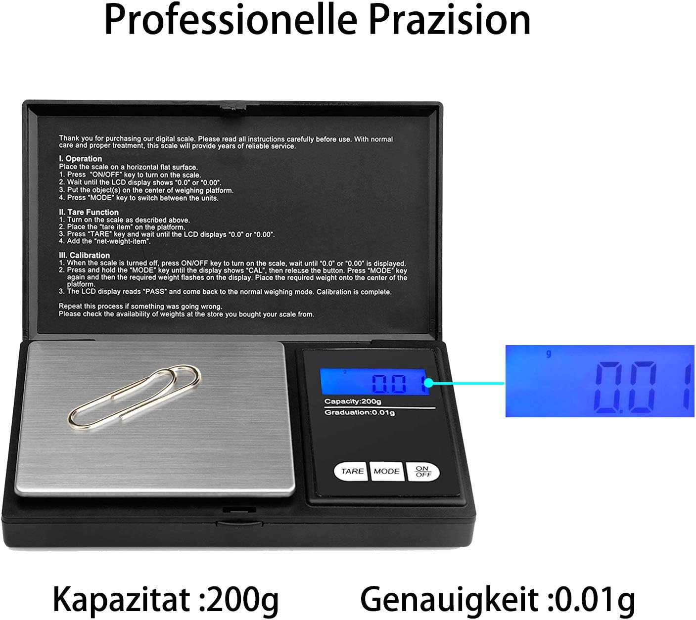 Eine Digitalwaage mit einer Sicherheitsnadel darauf. Die Waage zeigt 0,0 g an.