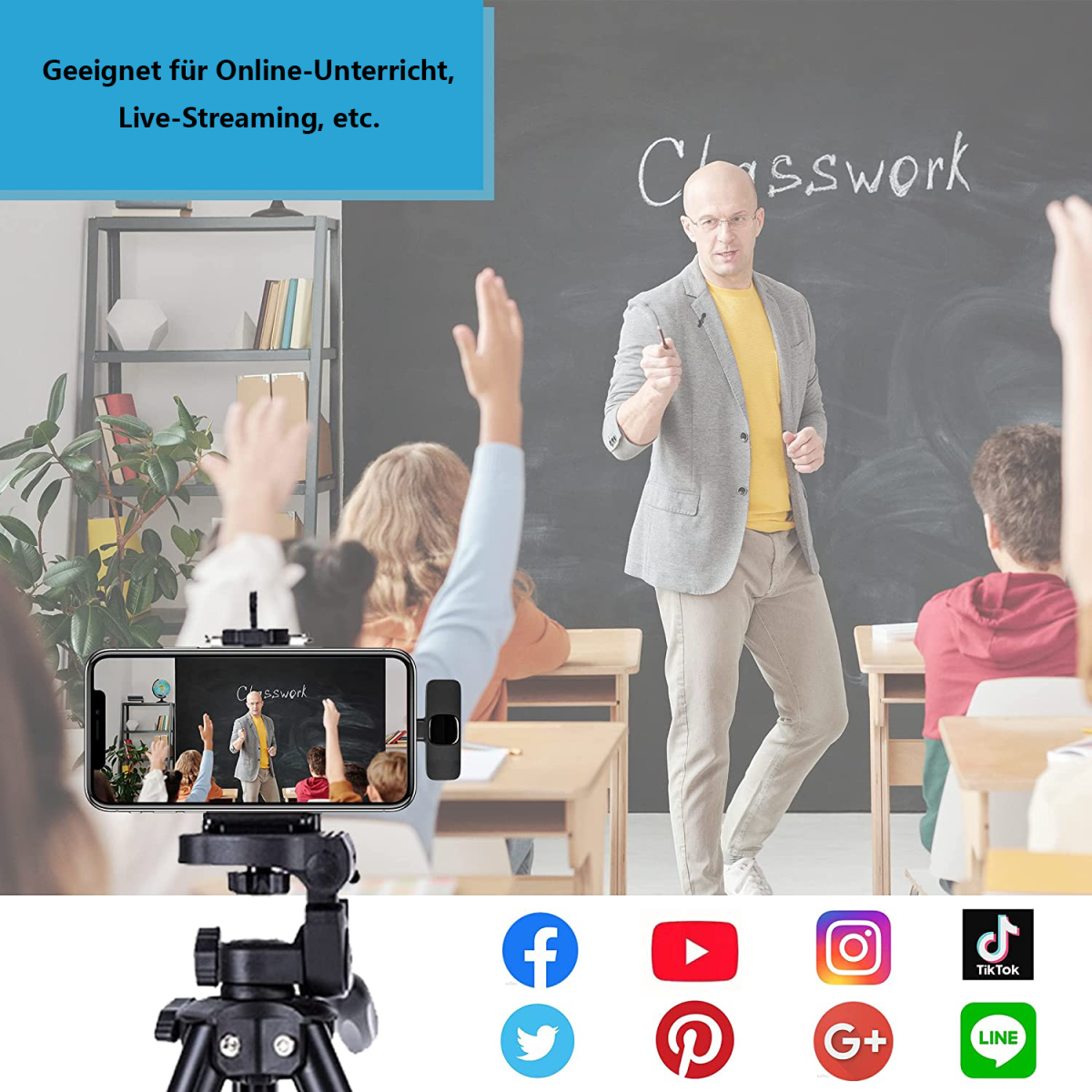 Ein Lehrer mit Schülern im Unterricht, ein Telefon auf einem Stativ fängt die Szene ein, Social-Media-Symbole.