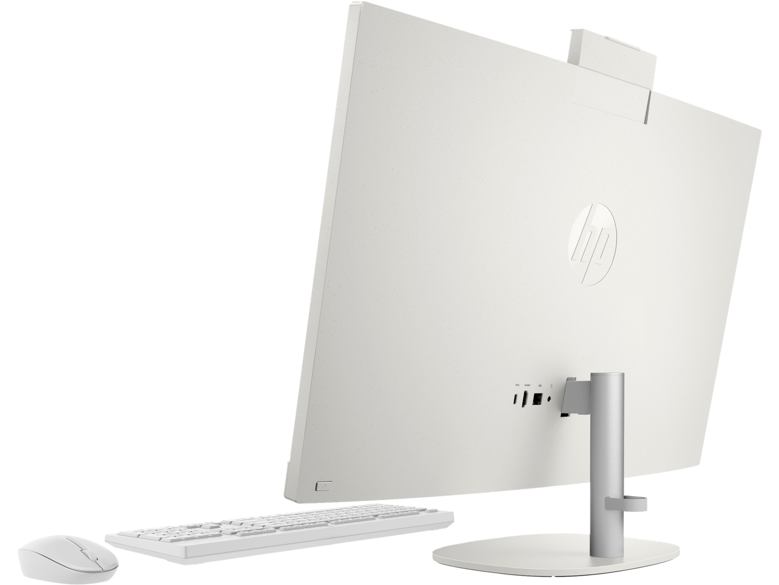 Ordenador blanco HP todo en uno, vista trasera, con teclado y ratón.