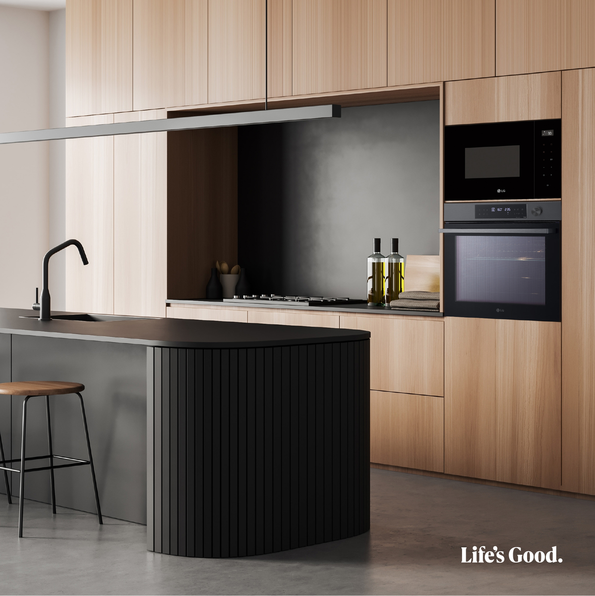 Cucina moderna con mobili in legno, isola e elettrodomestici. Pavimento in cemento, accenti neri.