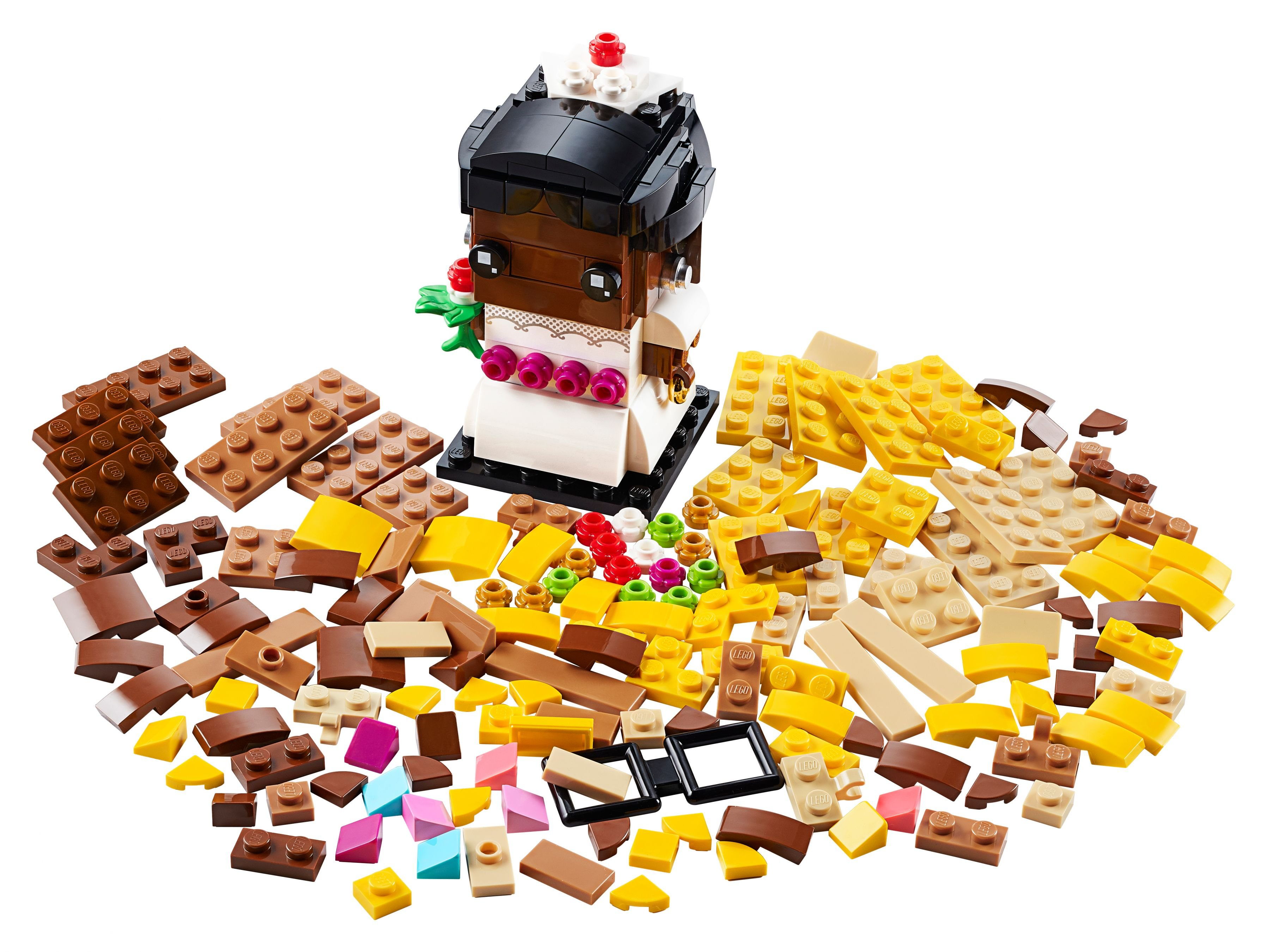 Eine Lego-Brautfigur mit verstreuten Blöcken. Blöcke sind in verschiedenen Farben wie Braun, Gelb und Rosa.