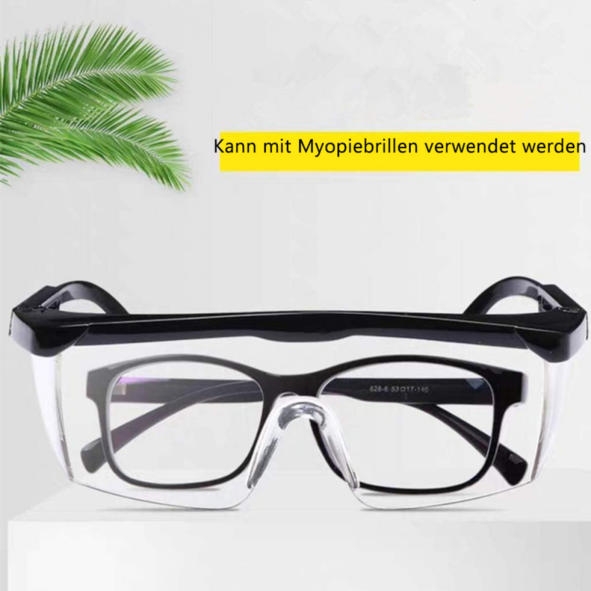 Schutzbrille über Brille, mit Text: 'Kann mit Myopiebrille verwendet werden'.