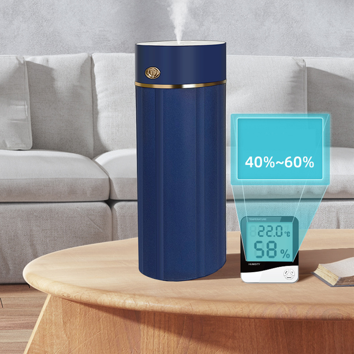 Blauer Luftbefeuchter mit Temperatur- und Feuchtigkeitsanzeige auf einem Holztisch.