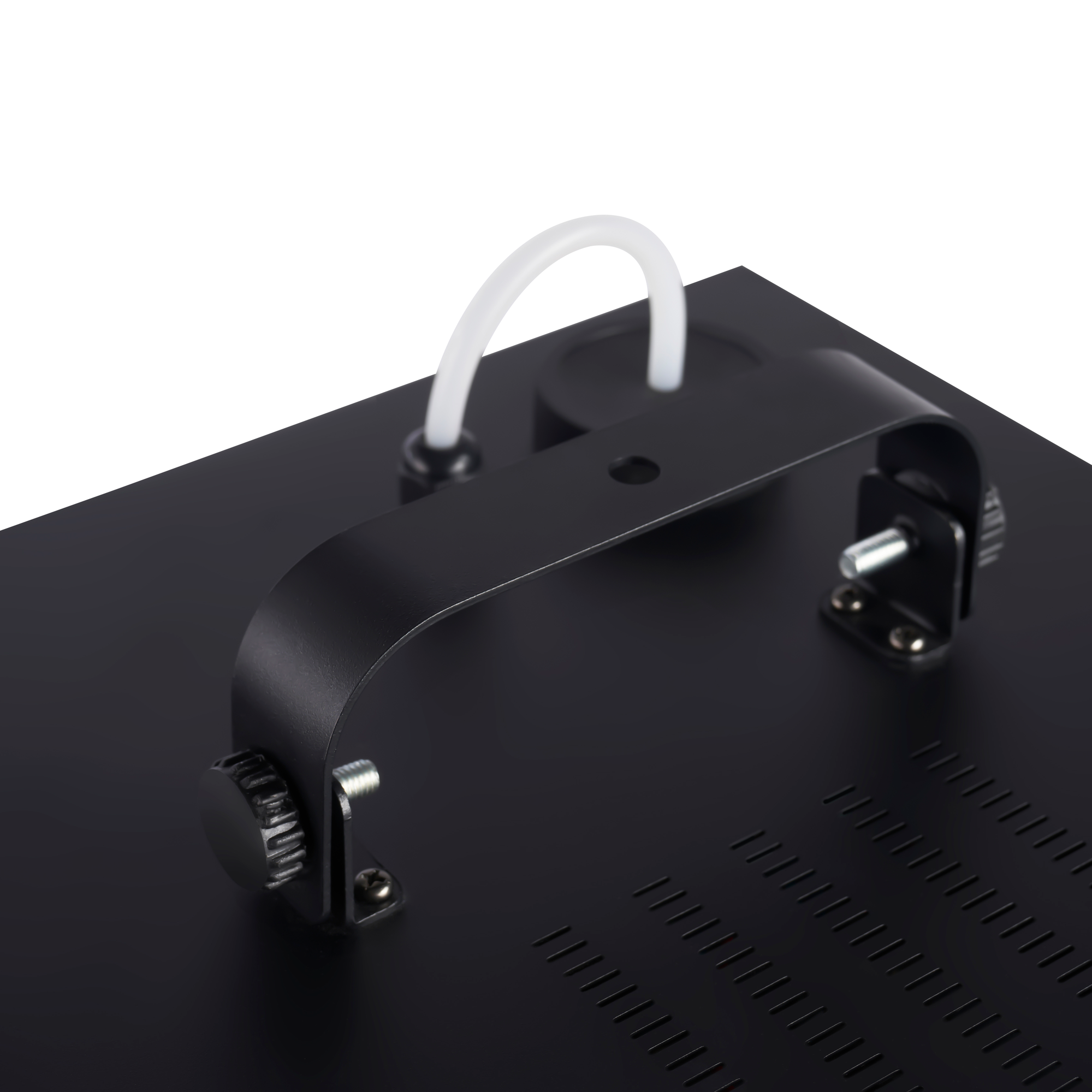 Black machine part with a handle and vent holes, with a white tube above.