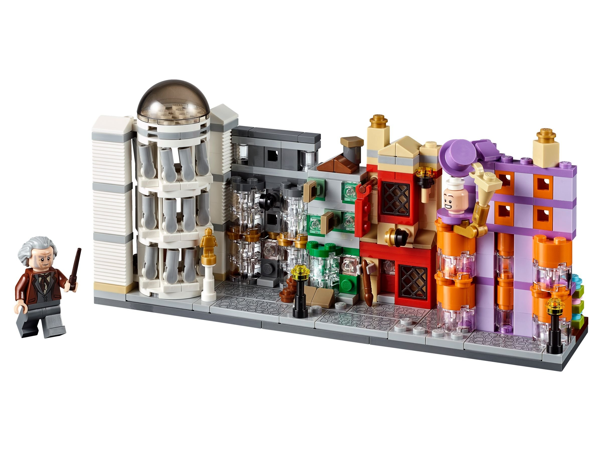 Lego set of a colorful street with buildings, shop fronts, and a Lego character.