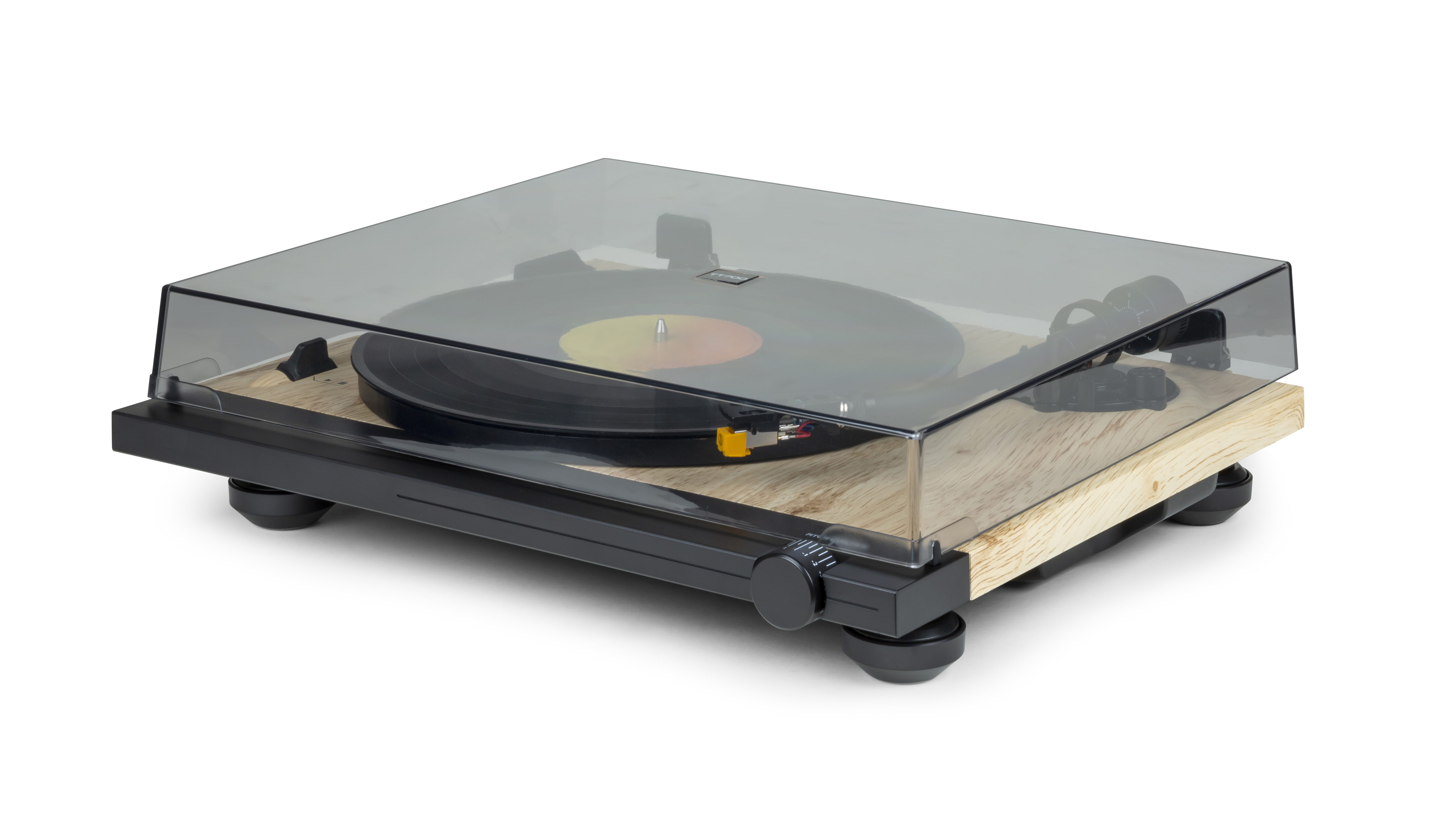 Tocadiscos con un disco reproduciéndose, encerrado en una cubierta transparente.
