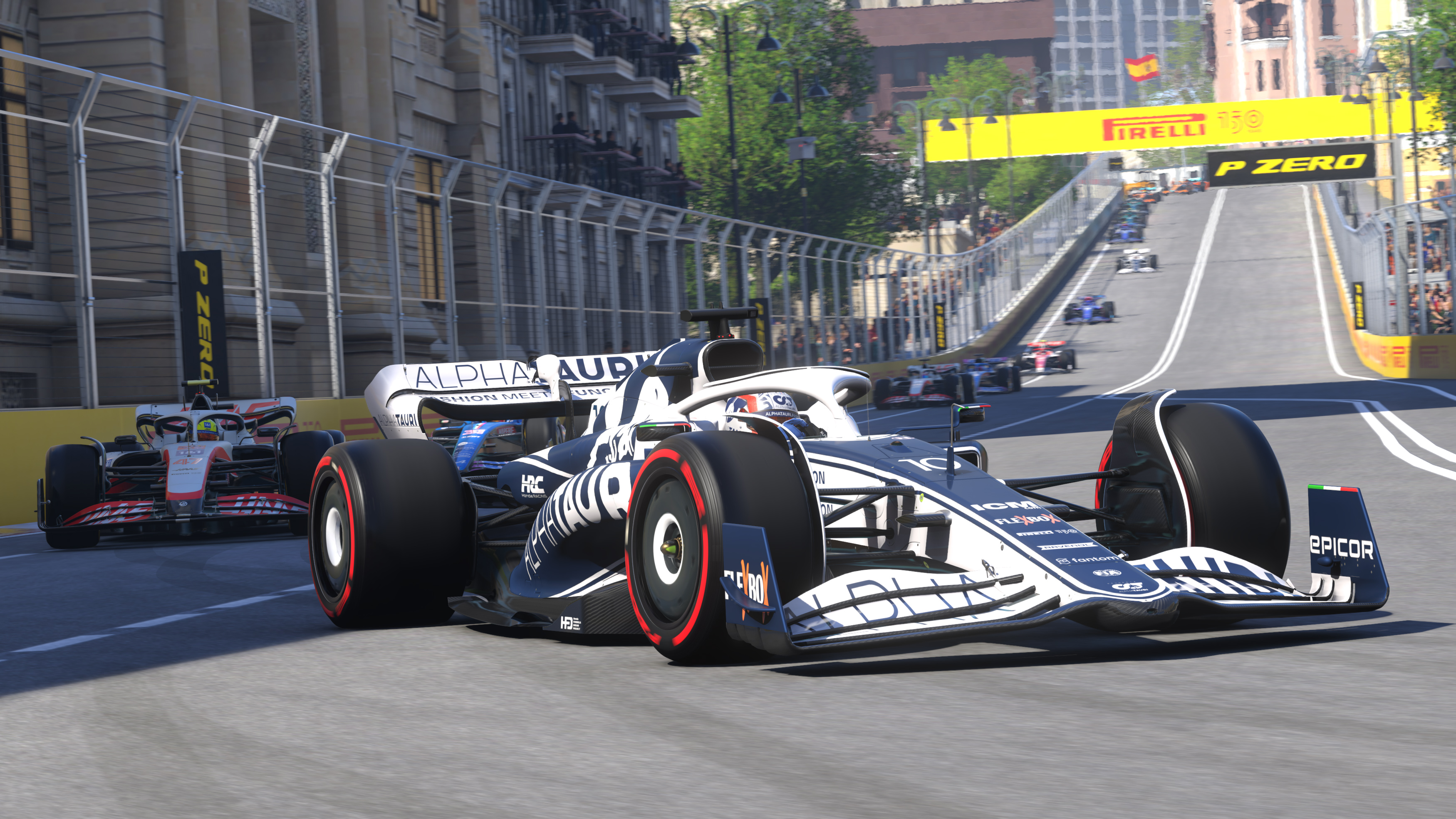 Gara di Formula 1 in corso. Diverse auto corrono su una pista, con spettatori.