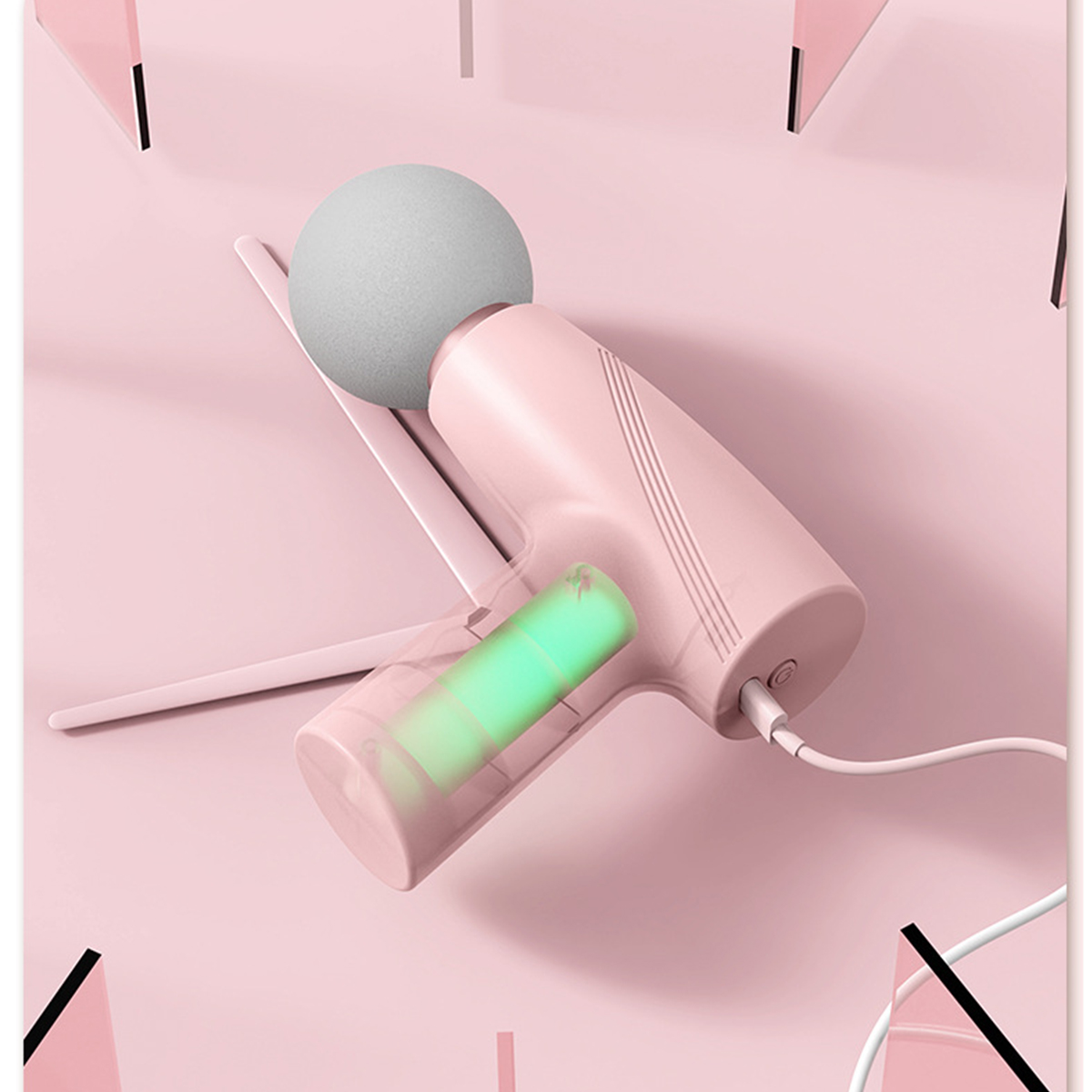 Ein rosa Gerät mit einem grauen Ball und einem transparenten Abschnitt mit grünem Licht.