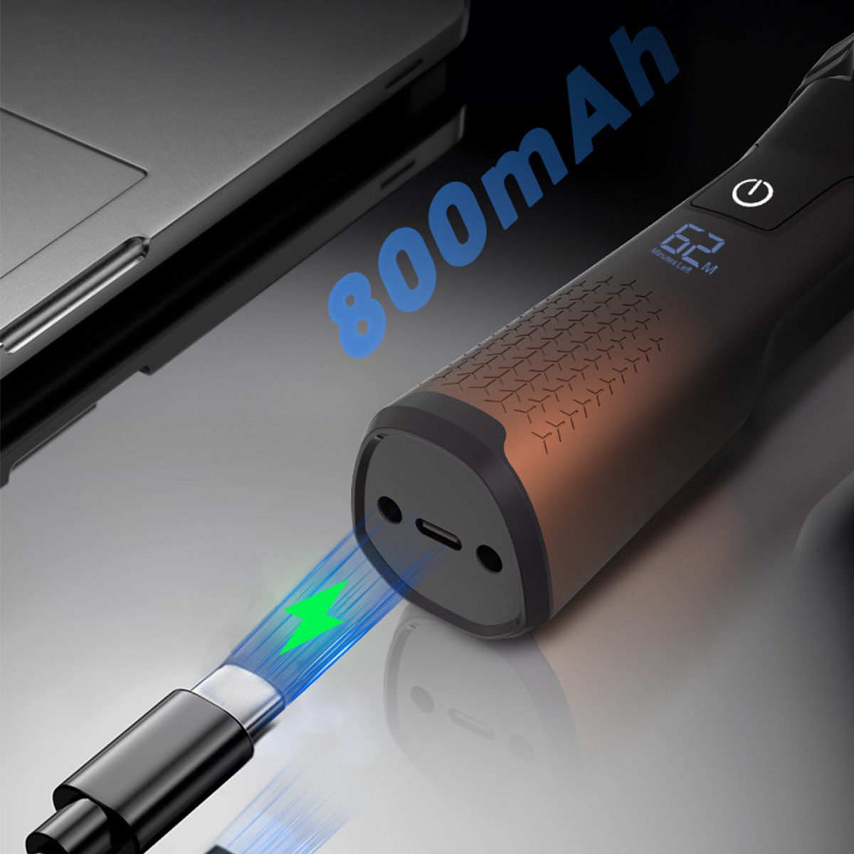 Ein schwarzer und bronzefarbener Rasierer mit Ladekabel und 800 mAh.