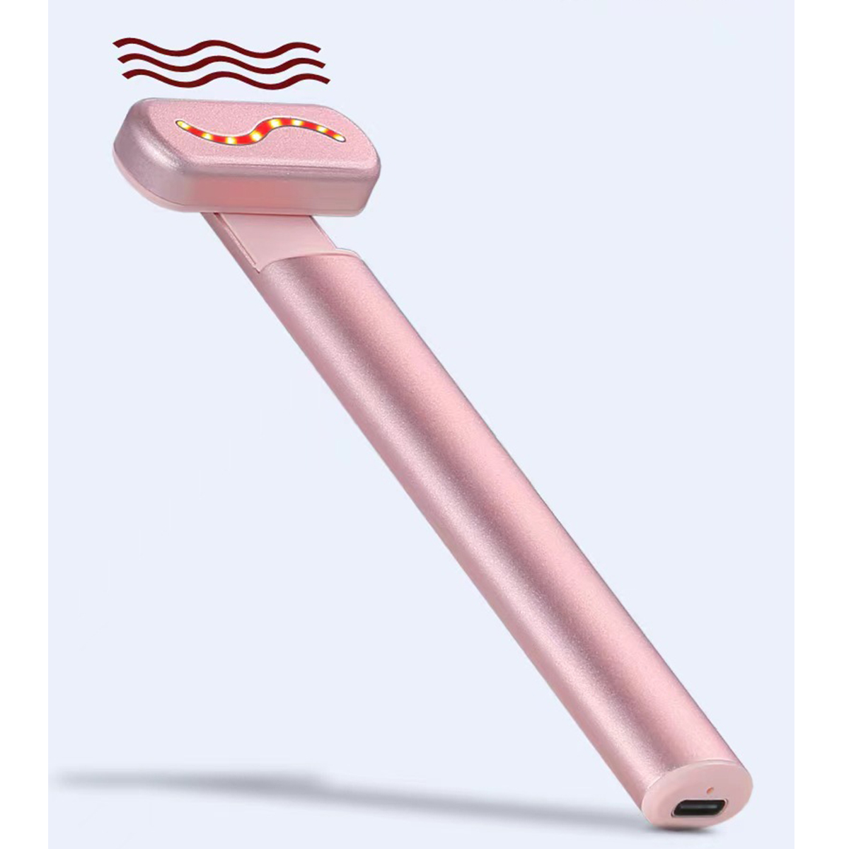 Rosa Gesichtsmassagegerät mit rotem Licht. Das Werkzeug hat einen Griff.