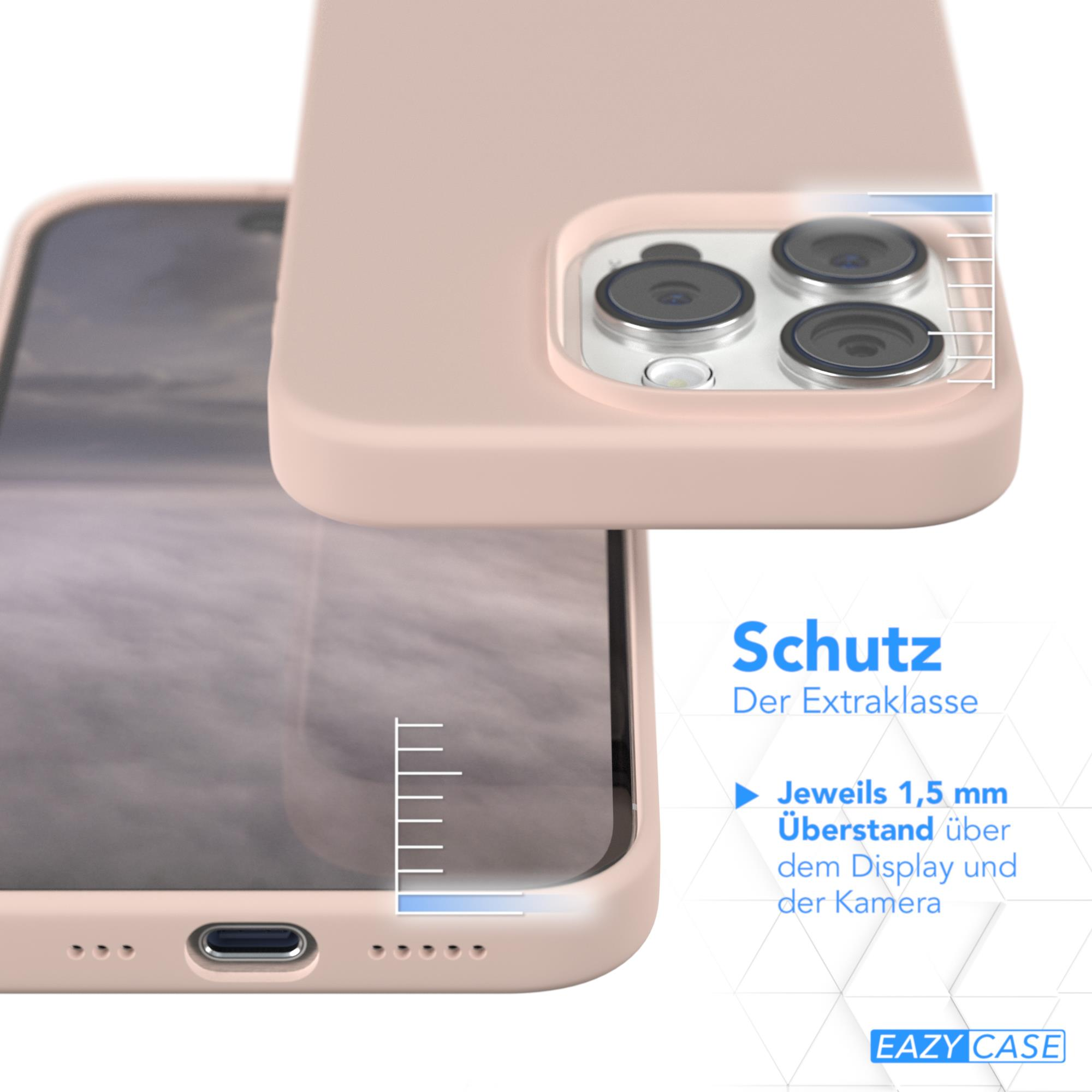 Eine Handyhülle liegt über einem Handy. Die Hülle ist rosa.