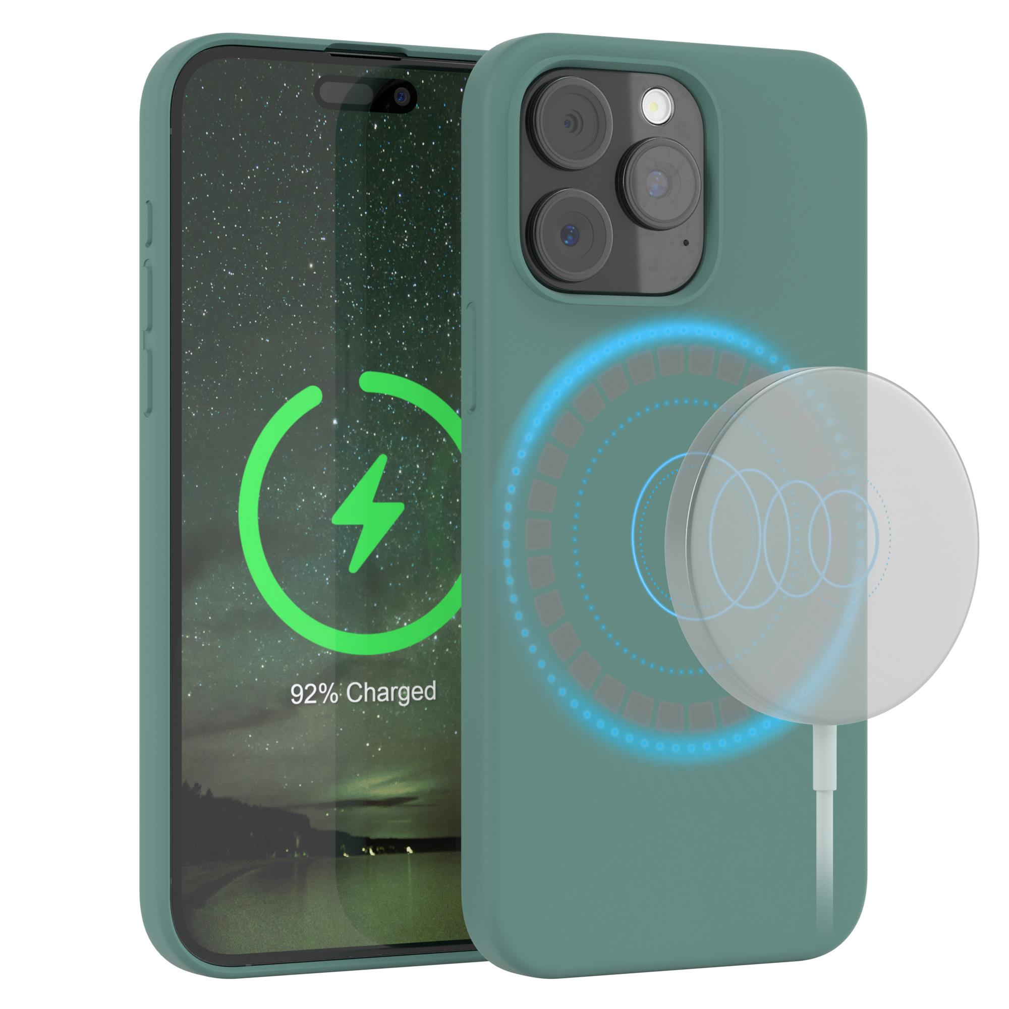 Grünes Telefon mit Hülle, kabelloses Ladegerät rechts. Telefonbildschirm zeigt ein Ladesymbol.