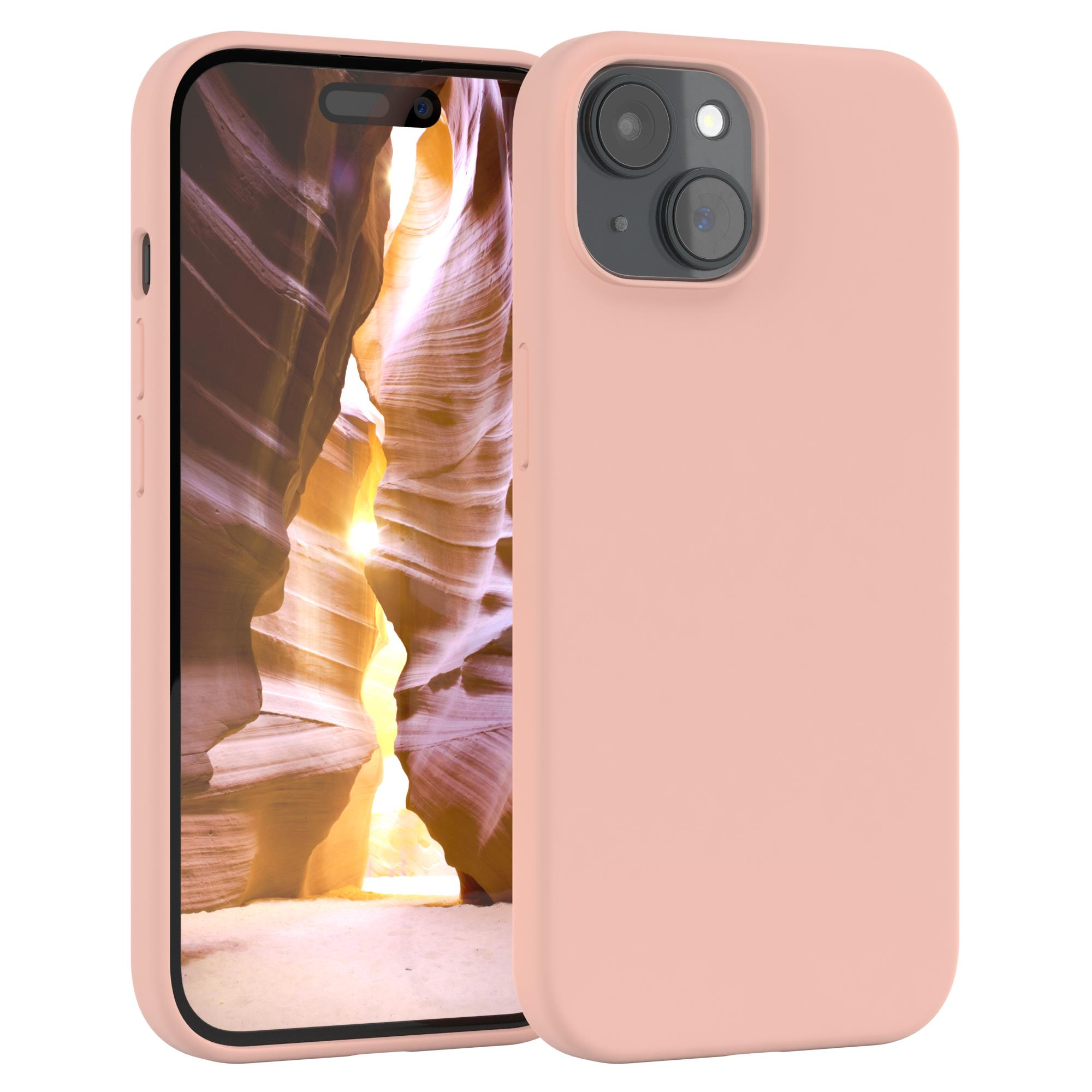 Rosa Handyhülle auf einem Telefon. Das Telefon ist offen. Der Hintergrund ist ein Canyon.