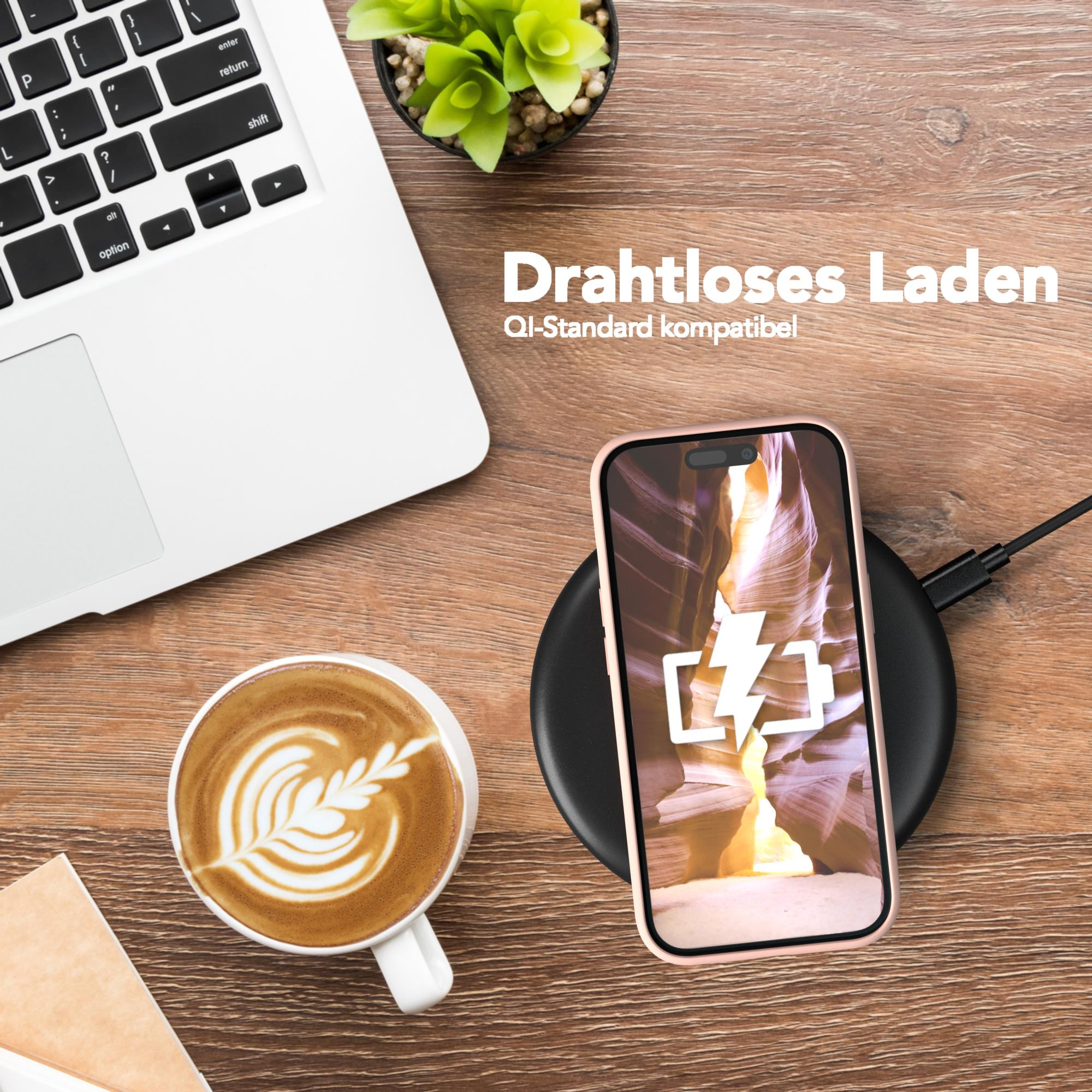 Kabelloses Ladegerät mit ladendem Telefon, Kaffeetasse und Laptop.