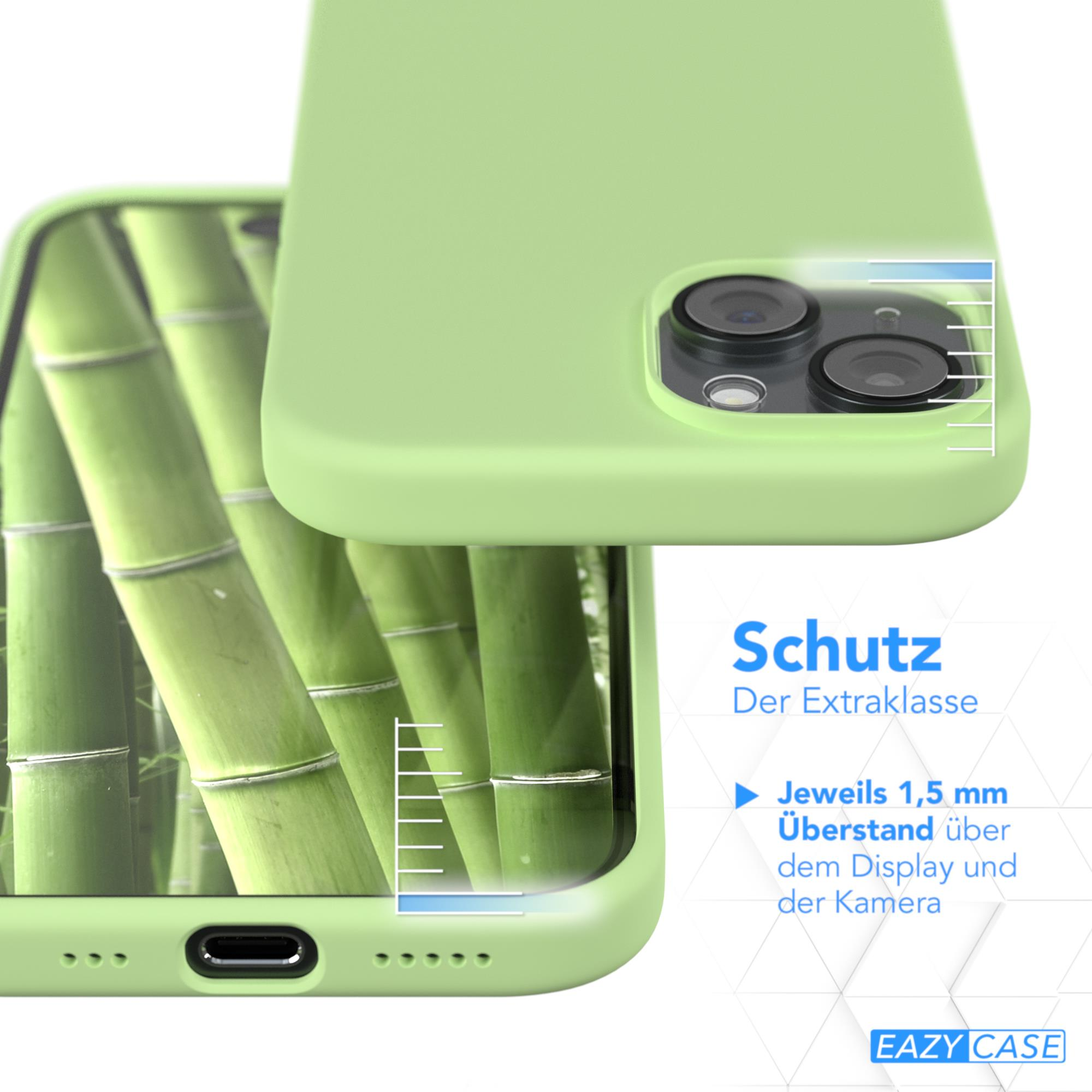 Grüne Handyhülle mit Telefon. Die Hülle befindet sich in der Nähe eines Bambuswaldes.
