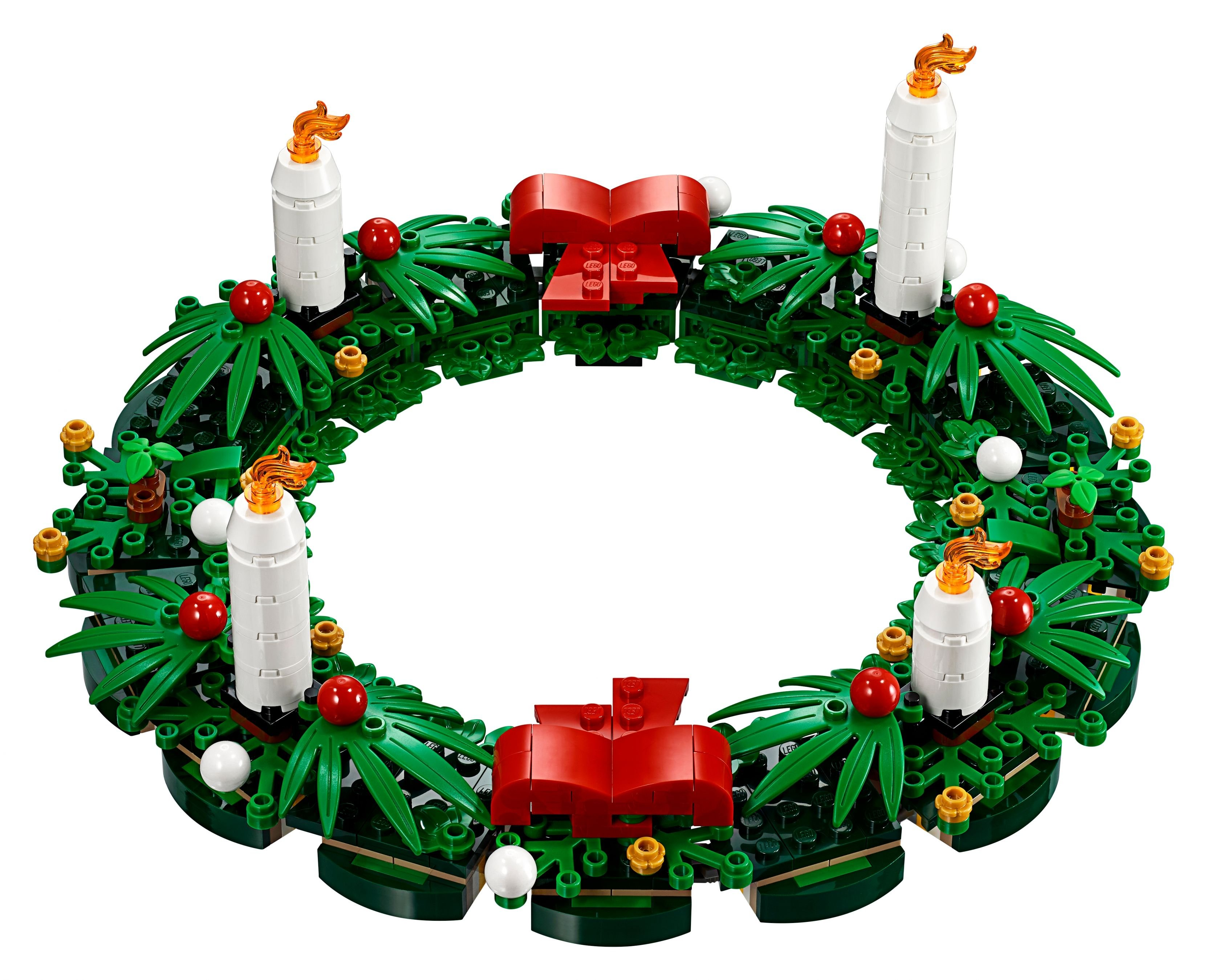 LEGO Noel çelengi, dört mum ve kırmızı kurdele ile.