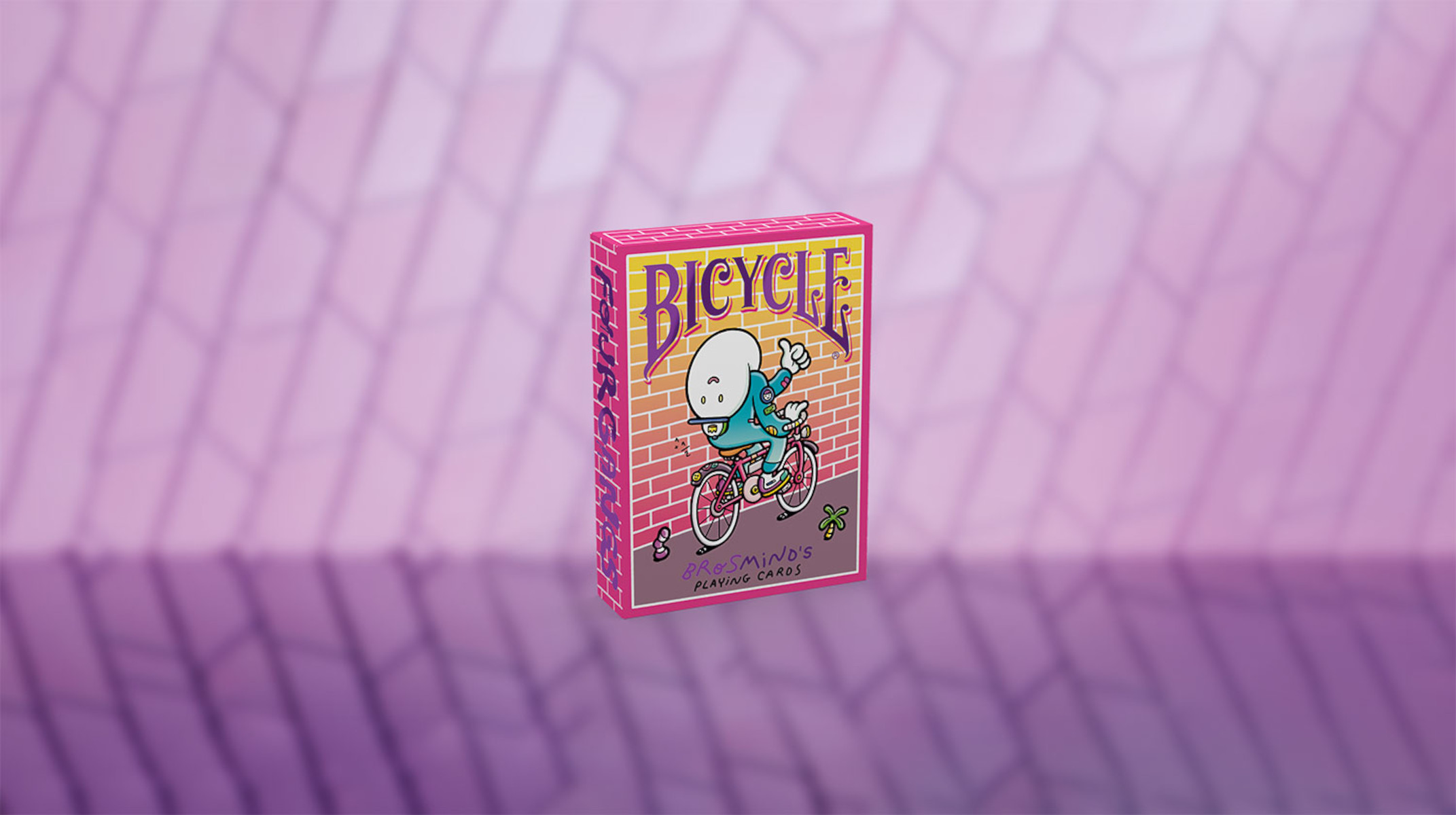 Rosa Bicycle Spielkartenbox. Cartoon-Figur auf der Vorderseite. Lila und rosa Hintergrund.