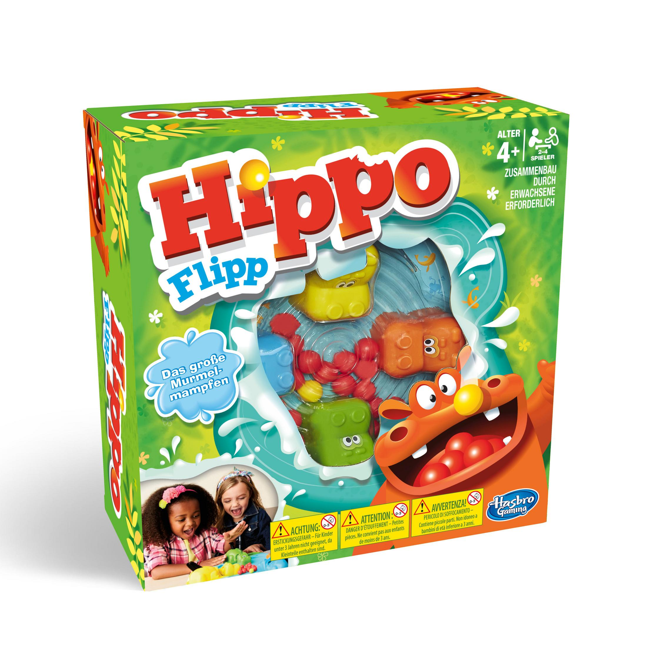 Schachtel des Hippo Flipp-Spiels mit bunten Nilpferden und spielenden Kindern. Grün und Orange.