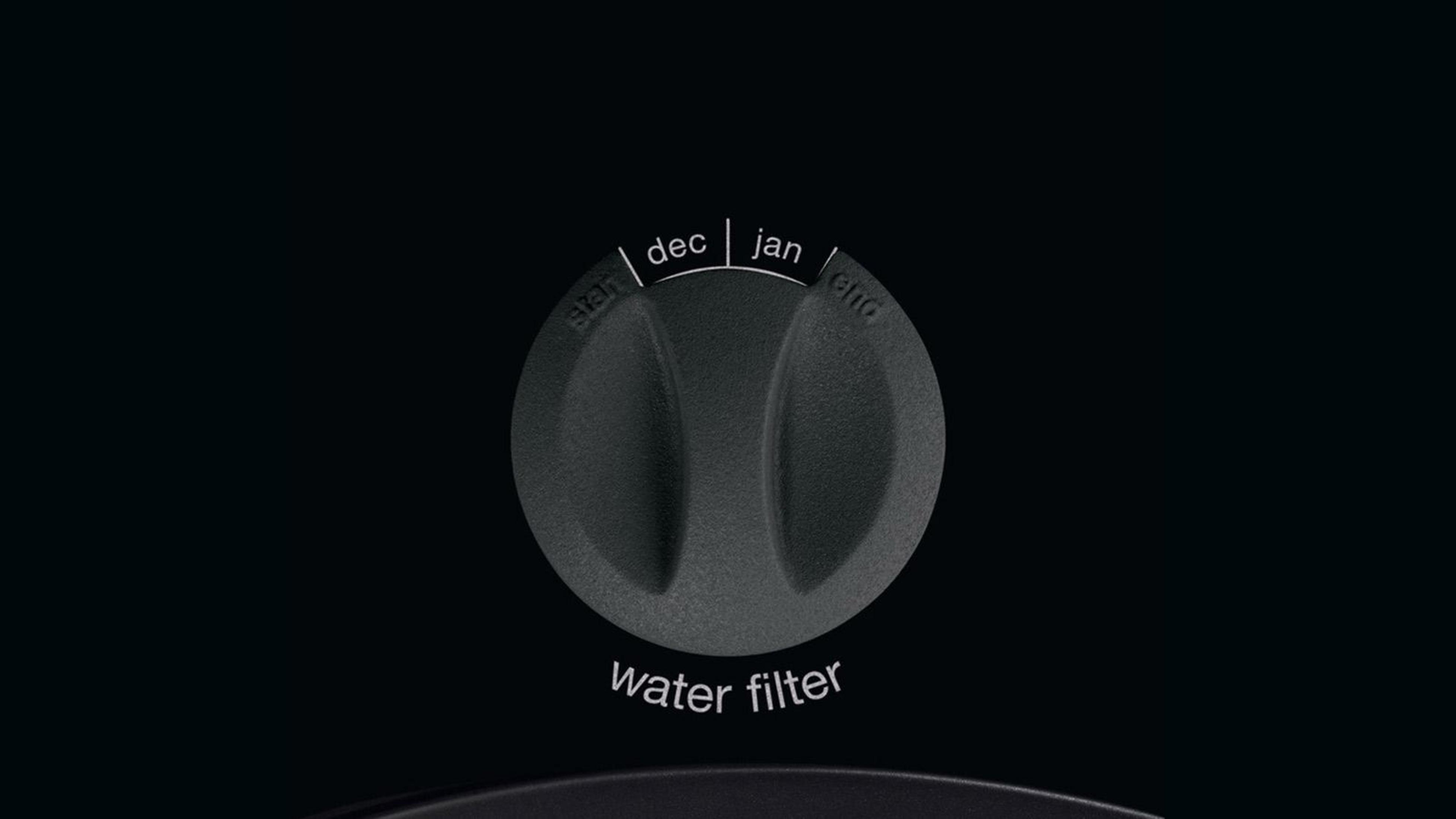 Czarny wybierak filtra wody z oznaczeniami 'dec', 'jan' i 'water filter'.
