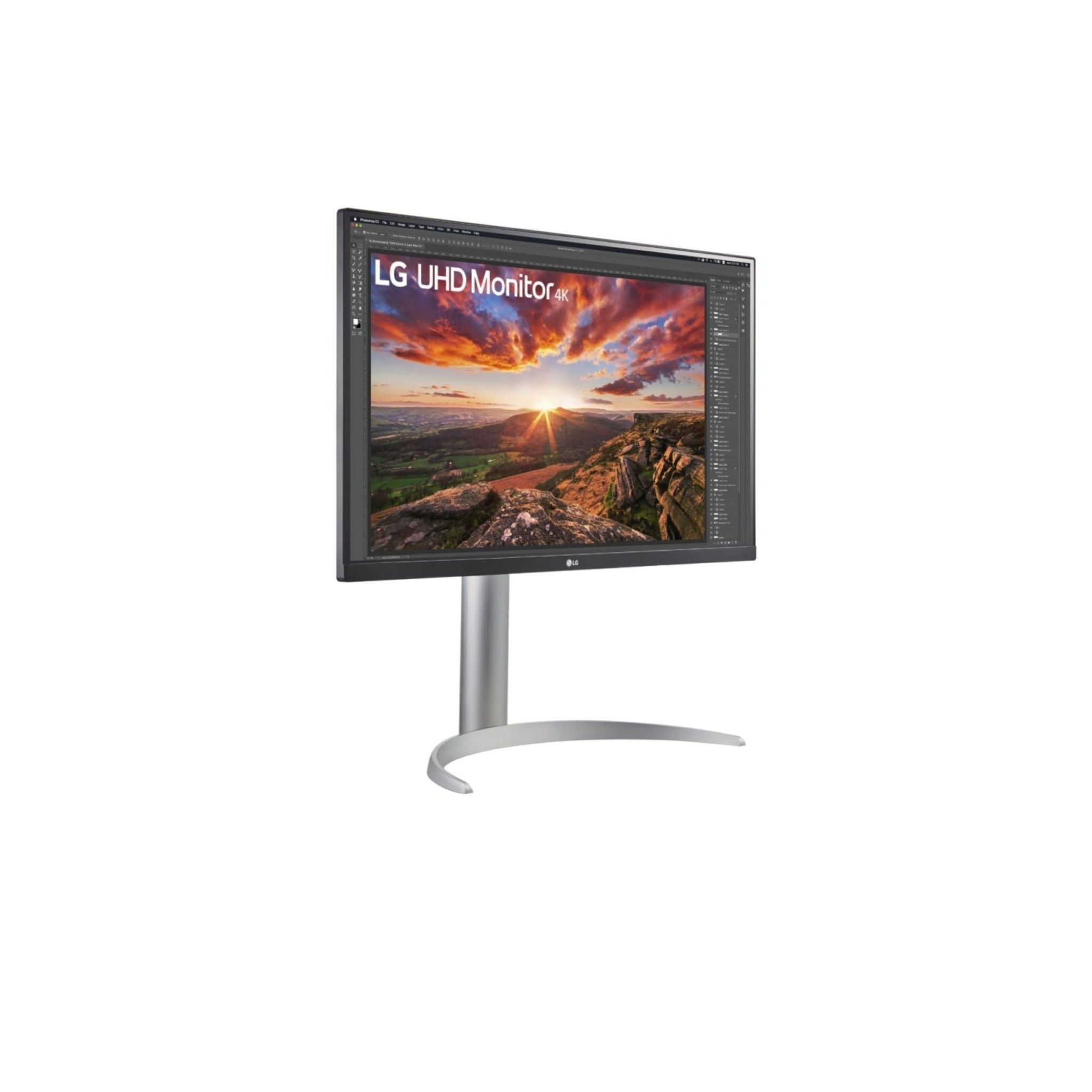 Monitor LG UHD 4K su sfondo bianco, mostra un tramonto. Il supporto è argento.