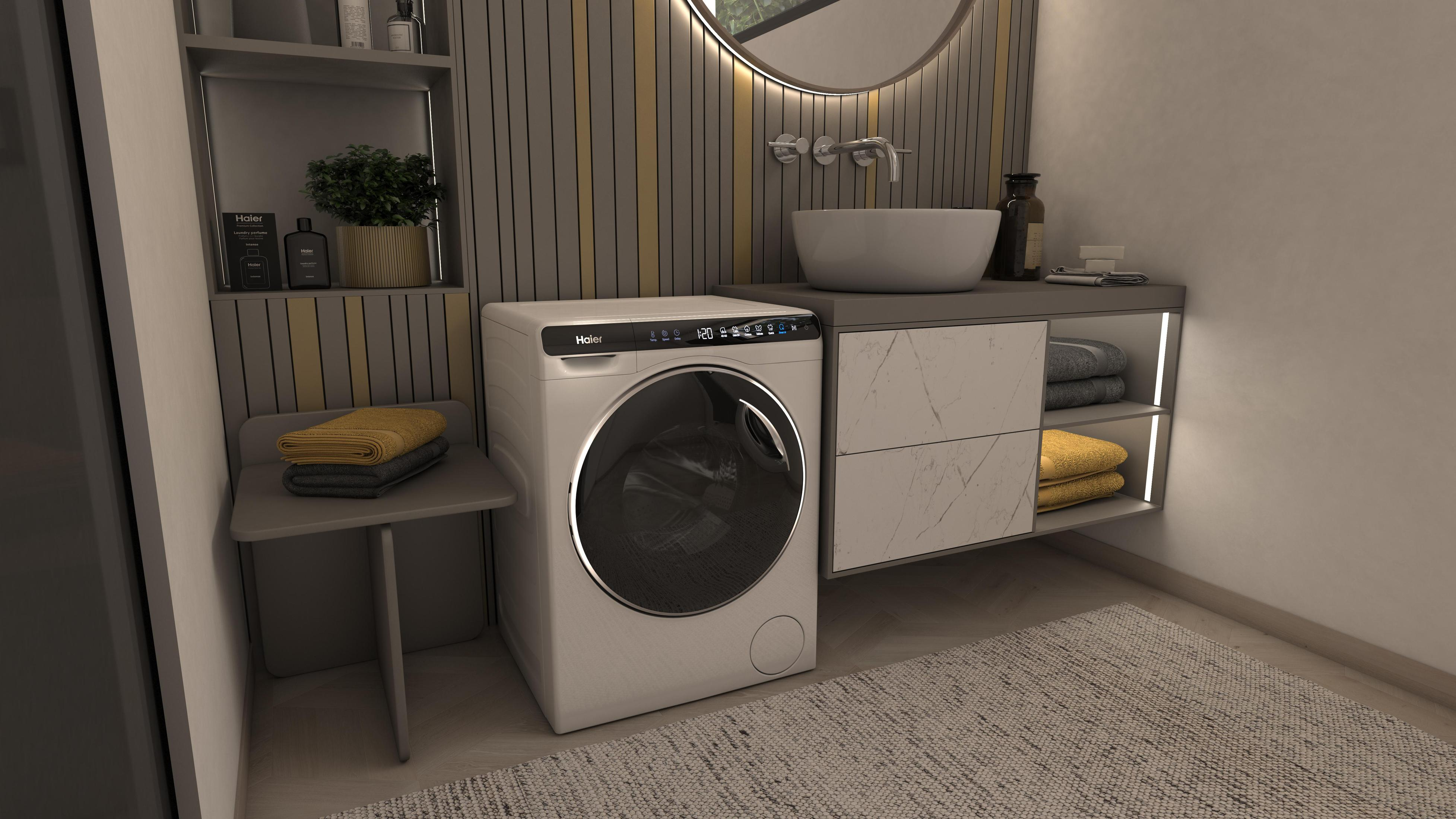 Interno bagno con lavatrice, lavandino e asciugamani. Design moderno.