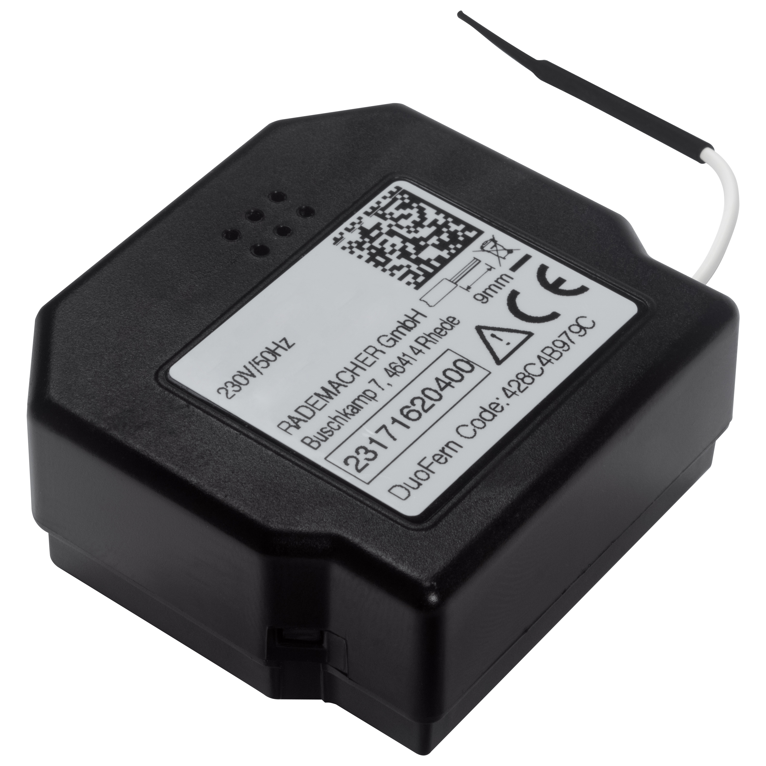 Dispositivo nero quadrato con etichetta, antenna e fili. Si trova su una superficie bianca.