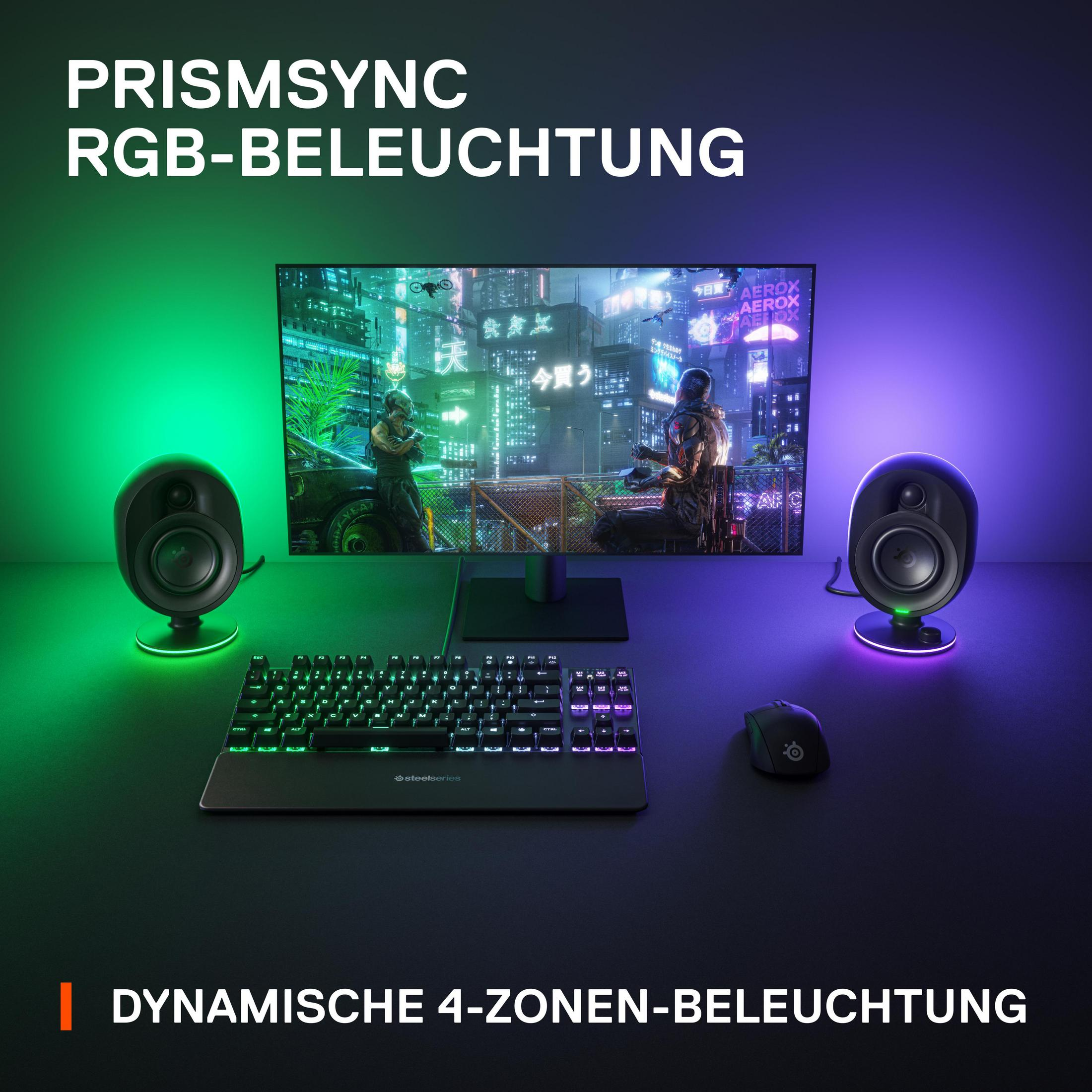 Konfiguracja komputera z monitorem, klawiaturą, myszką i dwoma głośnikami z kolorowymi światłami.