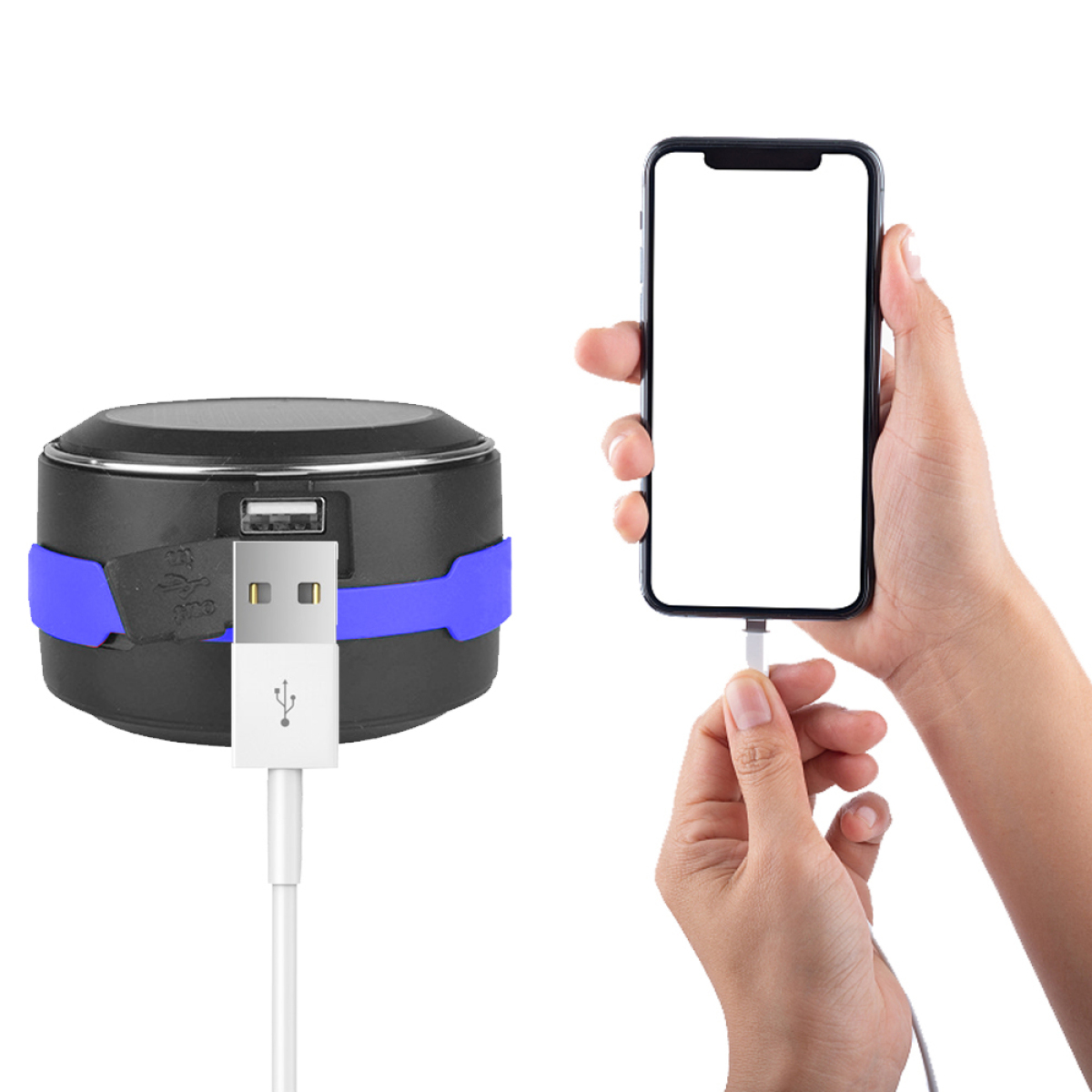 Ein schwarz-blauer Lautsprecher mit einem USB-Kabel, das mit einem Telefon verbunden ist.