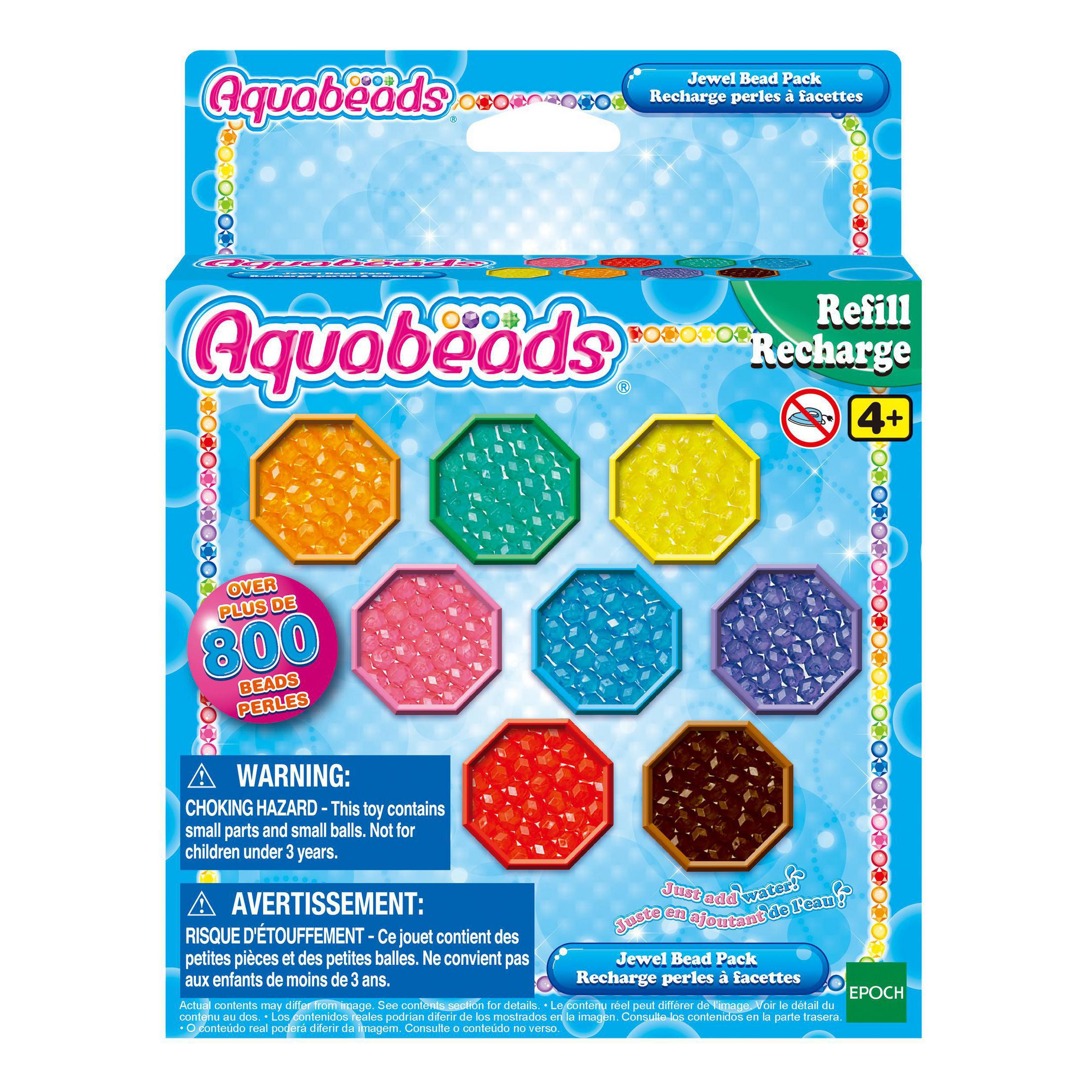 Eine Schachtel mit Aquabeads-Nachfüllpackung, die bunte Perlen und Sicherheitshinweise auf der Verpackung enthält.