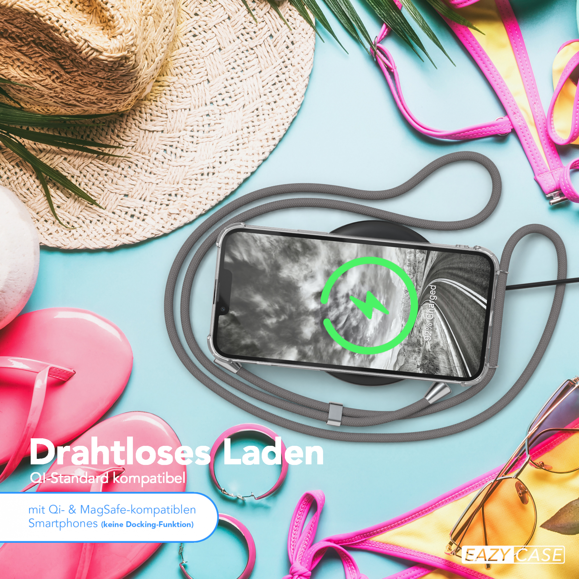 Strandszene mit ladendem Telefon, Flip-Flops, Sonnenbrille und Text, auf blauem Hintergrund.