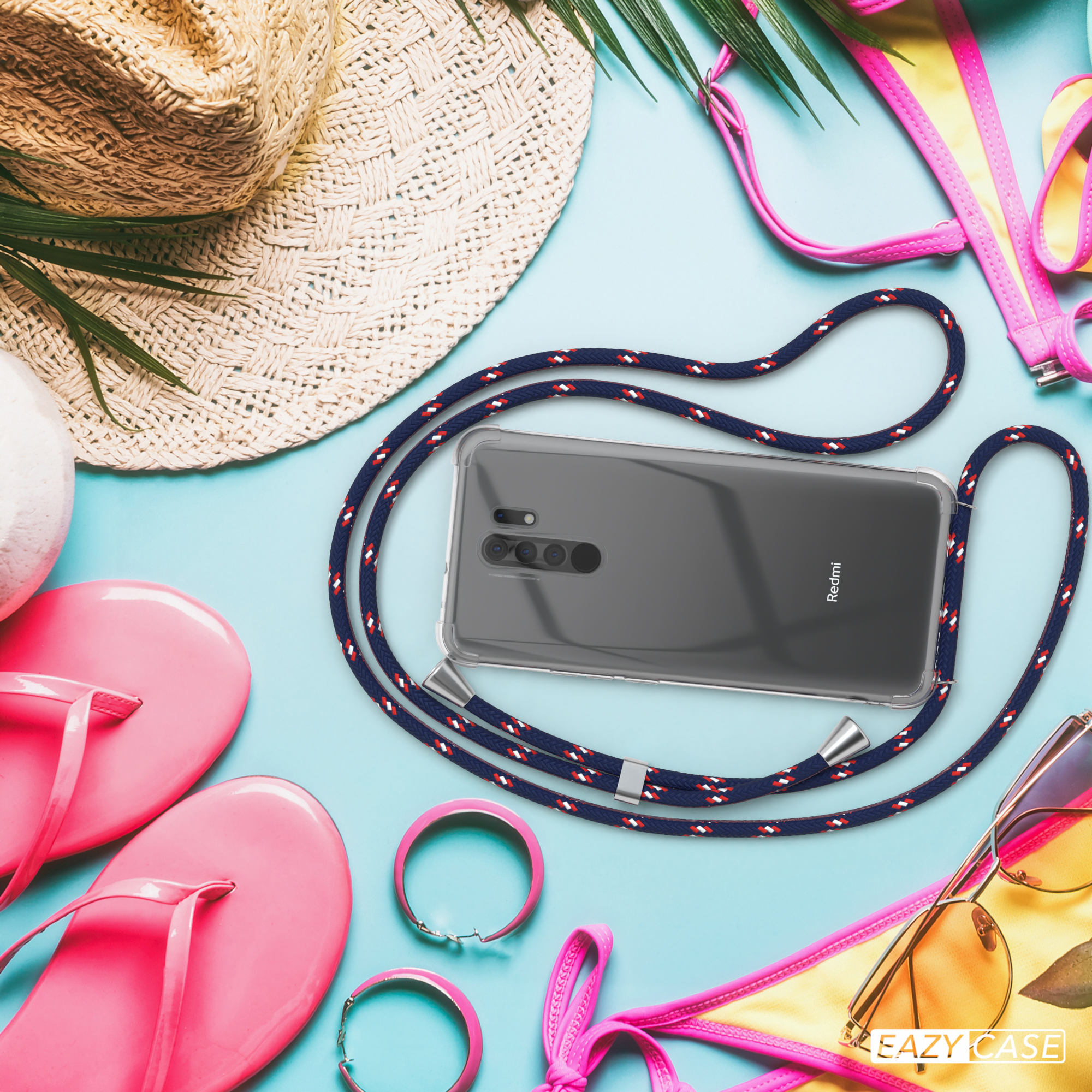 Telefon mit Lanyard und Strandzubehör: Hut, Sandalen, Sonnenbrille und Bikini-Oberteil.