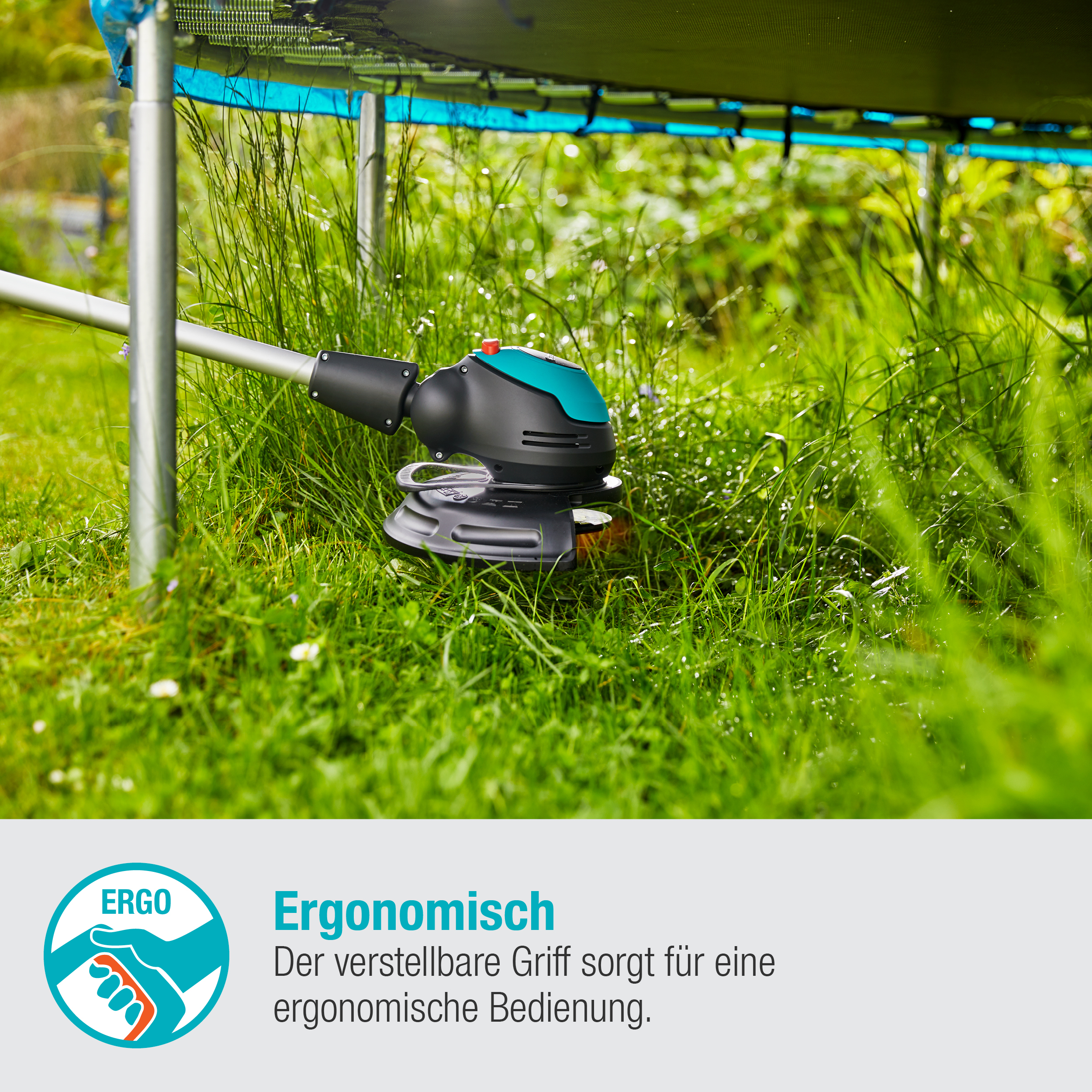 Eine Person mäht Gras mit einem grün-schwarzen Trimmer.