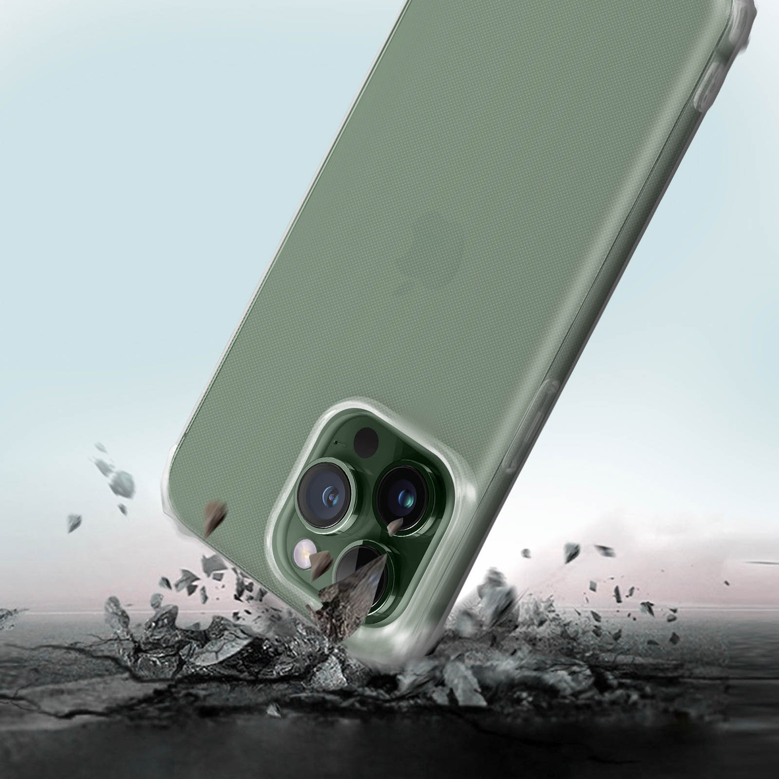 Een telefoonhoes valt, met gebarsten grond eromheen. De hoes is groen en de telefoon zit erin.