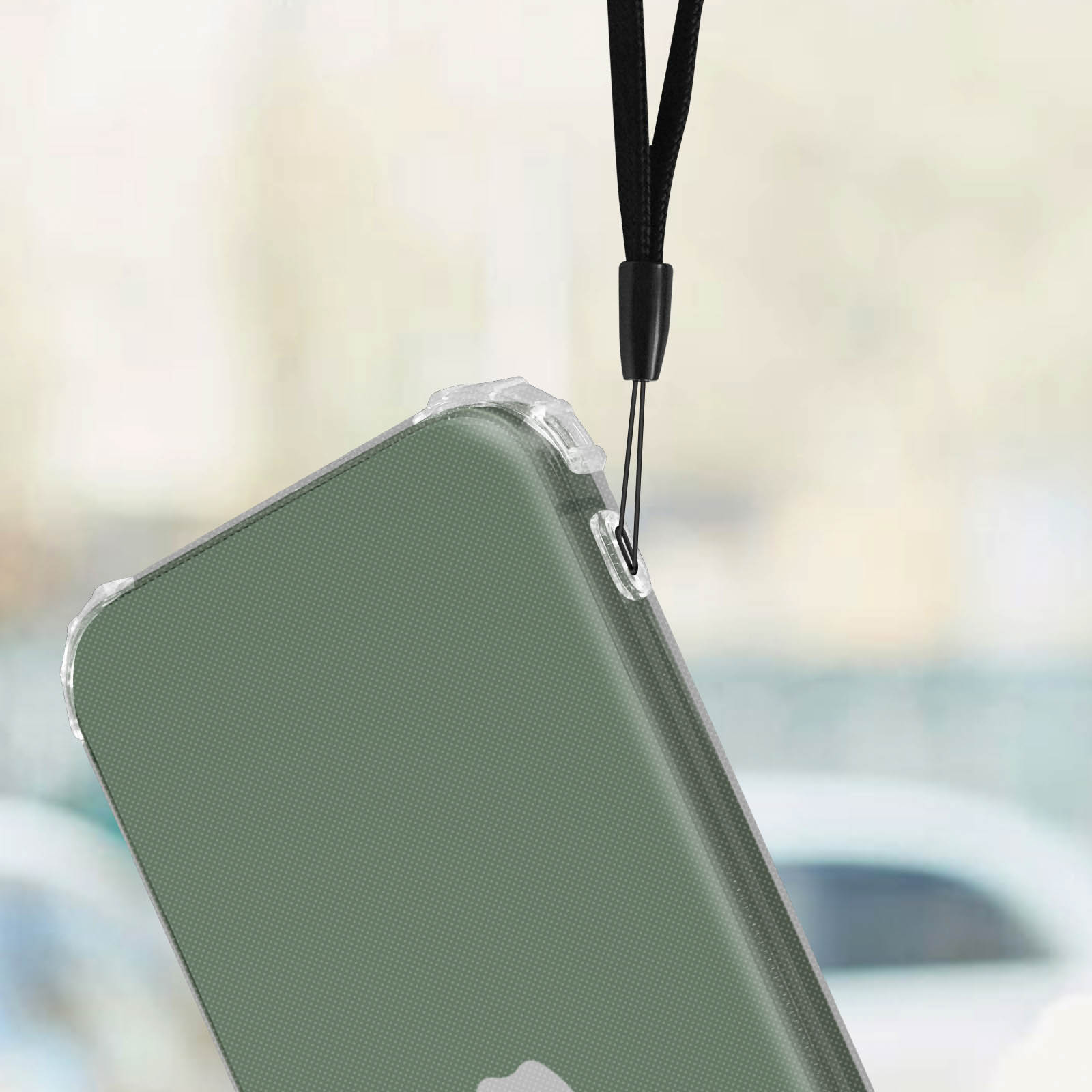 Een groene telefoonhoes met een zwart koordje eraan.