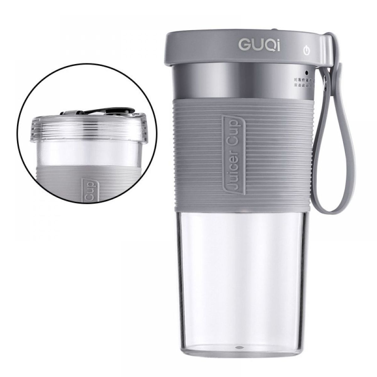 Grauer Juicer Cup mit Deckel. Der Becher hat einen grauen Griff. Nahaufnahme des Deckels.