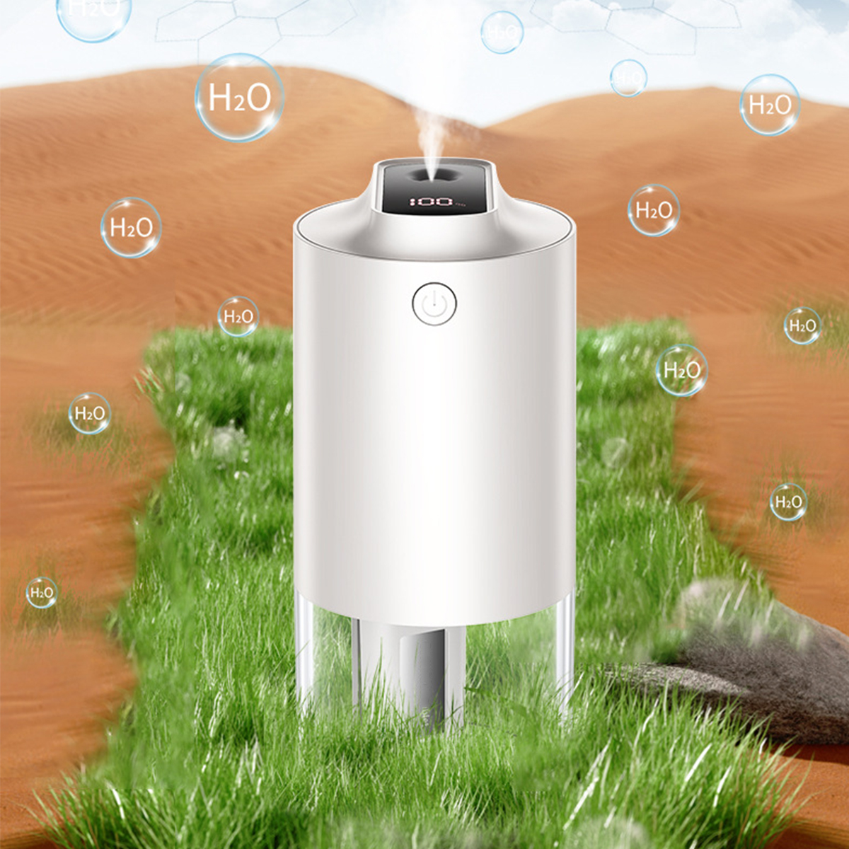 Weißer Luftbefeuchter gibt Dampf ab, umgeben von Wassertropfen, mit Gras im Hintergrund.