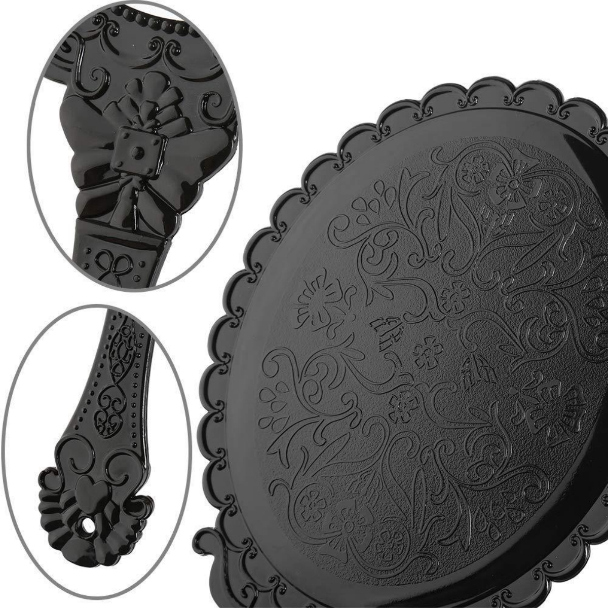 Schwarzer Handspiegel mit verziertem Griff und dekorativem Blumenmuster auf der Spiegelfläche.